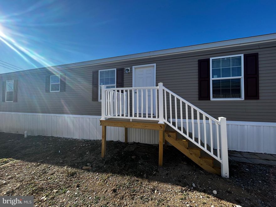 Welcome to this brand-new 2025 single-wide home located in a well-maintained mobile home park, offering a modern feel and a thoughtfully designed layout. The spacious, updated kitchen is a standout feature, showcasing contemporary finishes, ample cabinetry, and an open flow that makes everyday living and entertaining comfortable and functional. Throughout the home, you’ll appreciate the clean lines, natural light, and fresh, modern aesthetic that comes with new construction. Monthly lot rent is $485, and buyer must be approved by the park prior to closing. An excellent opportunity for low-maintenance living in a convenient location—schedule your showing today!

Tax records are ESTIMATED- there is no tax record. This has ground rent.