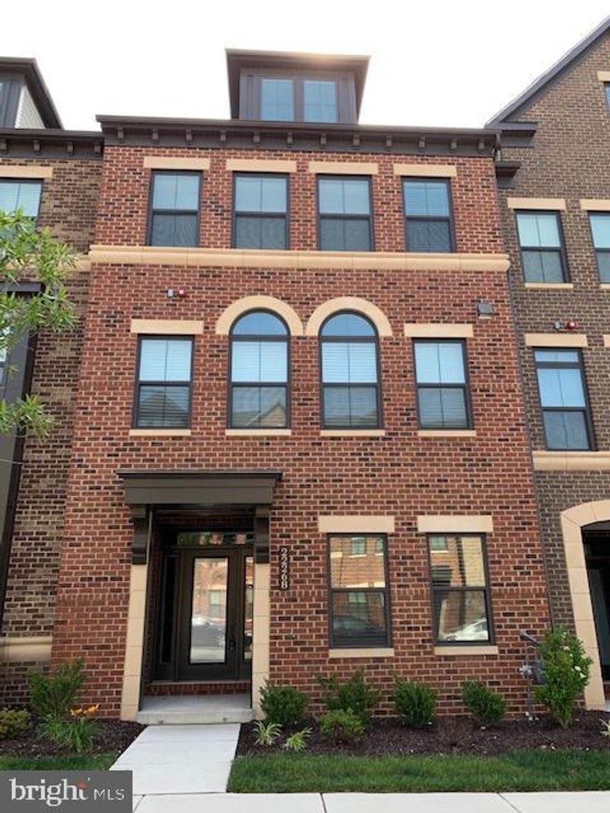 NV Homes Ballston Model with additional 4th level loft featuring a full bath, bedroom, living room and rooftop sun  deck. There is also a recessed/covered deck/balcony off the family room on the second level. The  2 Car rear garage has a driveway parking which can accommodate  2 more cars. There is on street parking as well.  This beautiful home has  upgraded appliances, wood floors, upgraded countertops in 2nd level kitchen.  Custom cordless blinds, 4 bedrooms, 3 full upgraded baths, 2 powder rooms. Primary bedroom has 2 walk-in closets, separate soaking tub and shower.  Entry level has additional  living room or study.  Shows Beautifully. Enjoy Community center and pool. Close to Ashburn Metro Station, Dulles Airport. Access to Greenway, Loudoun County Parkway, shopping. (Photo for reference only, Home is currently occupied, Showings after confirmation) No pets. no smoking.