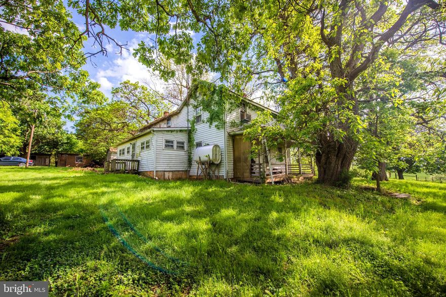 New Market Farmhouse on 29.58 rolling & wooded, good road access. Owners replaced in 2018 Furnace, chimney liner, water pump, pressure tank on well.  Great valley vista & mountain views! Due East of I-81 & short distance from Rt 211 New Market! Great potential on this parcel!  What are you waiting for?