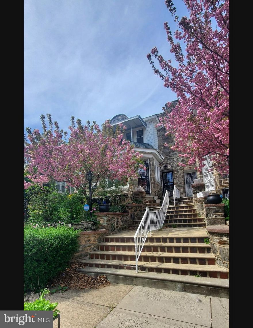 This lovingly cared for Wissahickon schist stone home on a vibrant and friendly block in Mount Airy has been completely updated without losing its original charm. Brand new solar panels, a newly finished basement (the square footage is not counted in the public record!), central air, central vacuum, new kitchen with induction cooktop and smart fridge, and a jacuzzi tub are some of the luxurious upgrades that went into this complete renovation. Set back from the street and perched high by a set of stairs, this house is adorned with beautiful plantings on the front slope. Upon entry you will notice the high ceilings, oversized windows, and open floor plan, which incorporates the dining room, living room, powder room, kitchen, pantry, and an adjacent wooden deck with greenhouse- the perfect spot for morning coffee al fresco. Upstairs you will find 3 bedrooms with high ceilings and an expansive full bath complete with a walk in shower, jacuzzi tub, double sink vanities, and skylight. The partially finished basement is a comfy den or playroom and is the perfect spot to watch movies or the big game with company. On one side of the den is a laundry and storage room, and another powder room. The other side leads to a one car garage that can also be accessed from the back alley which allows for 2 additional parking spots. Close to Pleasant Playground and Stenton station on the Chestnut Hill East line. Electric bills on request! Extremely low with solar power. Please go to public record for most recent tax info. The amount shown is without the homestead exemption.