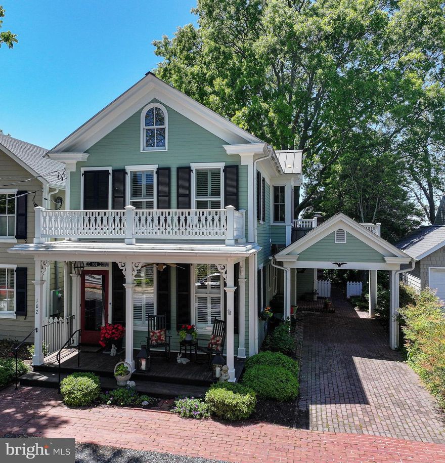 Prime waterfront home in Oxford’s beautiful historic district, faces west overlooking the Tred Avon River.  Offering the best in Oxford waterfront with prevailing SW summer breezes, fantastic year-round sunsets, a long dock, patio, old growth large trees, extensive hardscape and off-street parking make this property unique.  It has a carport and is located on a significant tree-lined street and lies with the “X” zone on the flood maps. On the first floor is an open, well equipped kitchen that opens to the great room with views
overlooking the patio, gardens and the river. One full bath on the first floor with a library/den and front entrance.  There is a primary bedroom suite on the second level adjoining a screened porch and deck with views to the Tred Avon beyond.  The views are extraordinary!  In addition, there is a second bedroom and bath on this level.