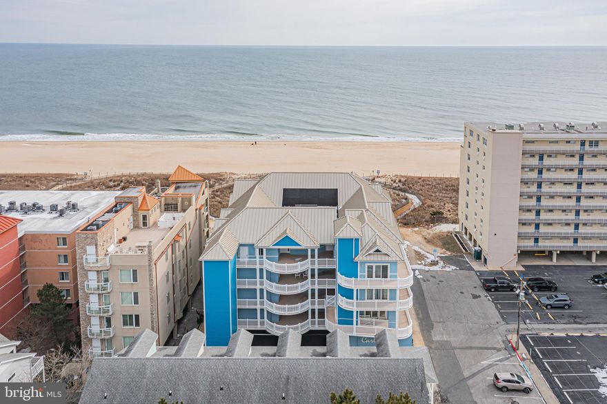 NEWLY  renovated in 2026, this stunning two-story oceanside townhouse is located in the prestigious Carly E, a luxury condominium known for its prime location and effortless access in to and out of Ocean City. Offering over 2,300 square feet of beautifully updated living space, this residence blends upscale design with relaxed coastal comfort.
The home features brand-new carpeting, fresh designer paint, and a modernized kitchen highlighted by Italian Calacatta quartz countertops. The open-concept living area flows seamlessly beneath dramatic hardwood cathedral ceilings and is anchored by a cozy fireplace—ideal for cooler seaside evenings.
With three spacious bedrooms and three full baths, the layout is both functional and elegant. Expansive wraparound balconies on both levels provide breathtaking ocean and bay views, creating the perfect setting for entertaining or unwinding at sunrise and sunset.
Additional highlights include a secured lobby ,indoor pool, smart-home upgrades allowing lights and fans to be controlled by an  app. and dedicated labeled parking spaces - a rare and valuable convenience at the beach.
Close to restaurants, bars, and shopping. this exceptional Carly E residence offers luxury, convenience and coastal living at the finest, all in a location that makes coming and going a breeze.