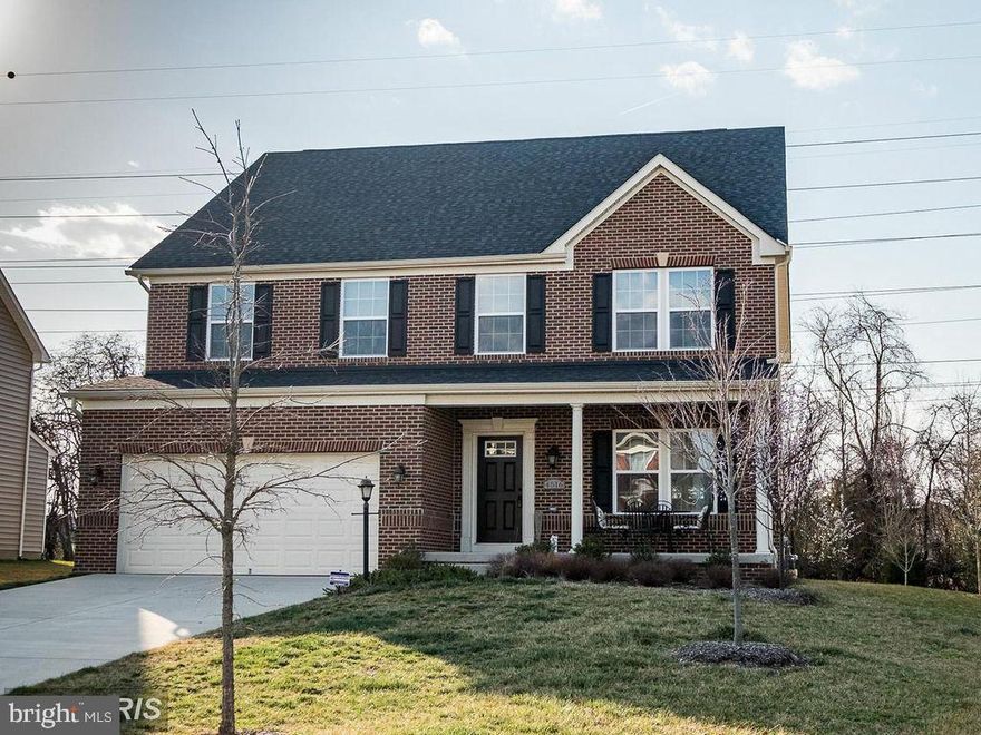 BEAUTIFUL IN DESIGN BEST DESCRIBES THIS 4 BEDROOM, 2 FULL AND 2 HALF BATH COLONIAL WITH A BRICK FRONT.   FEATURES INCLUDE:   HARDWOOD FLOORS, GOURMET KITCHEN WITH UPGRADED CABINETS, DOUBLE WALL OVEN AND GRANITE COUNTERS, MORNING ROOM, FIREPLACE IN FAMILY ROOM, MASTER BEDROOM WITH TRAY CEILING, FINISHED BASEMENT, LOT BACKS TO TREES.  MAKE THIS ONE YOURS TODAY!