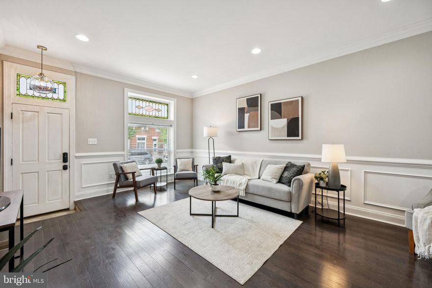 14FT+ WIDE CUSTOM CHAP RENOVATION WITH OFF-STREET PARKING NOW AVAILABLE IN THE HEART OF BREWERS HILL. GLISTENING HARDWOODS CASCADE THROUGHOUT. ENJOY CUSTOM CABINETRY, UPGRADED TRIM AND PAINT PACKAGE, IMPORTED TILE, GRANITE COUNTERTOPS, HIGH END SS APPLIANCE PACKAGE IN DESIGNER CHEF'S KITCHEN WITH LARGE ISLAND. LOW TAXES. LOADS OF NATURAL LIGHT. FINISHED LOWER LEVEL. HIGH CEILINGS. TONS OF STORAGE. WALK-IN SHOWERS. WALK-IN CLOSETS. EXPANSIVE ROOF DECK FOR ENTERTAINING - GREAT CITY VIEWS. CLOSE PROXIMITY TO RETAIL SHOPPING, LOCAL DINING, INNER HARBOR, PATTERSON PARK, AND ALL MAJOR HIGHWAYS. SCHEDULE A PRIVATE TOUR TODAY. ROUGHLY 3 YEARS REMAIN ON THE HISTORIC CHAP TAX CREDIT.