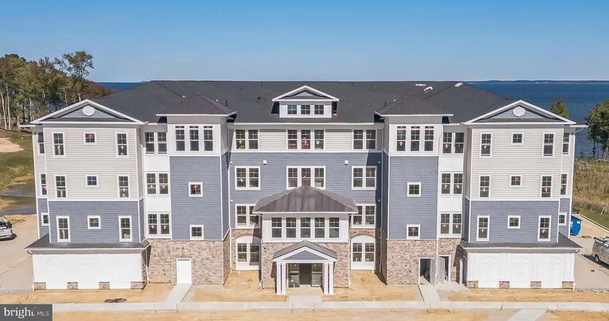 Welcome to unparalleled waterfront luxury at 129 Wheelhouse Way, Unit 2032, in Chester, MD! This exquisite 2-bedroom, 2.5-bath condo features an open floor plan with breathtaking water views and abundant natural light streaming into every room. The kitchen, dining, and living areas offer a seamless flow, all framing stunning ocean vistas. In the chef-inspired kitchen, you’ll find a spacious island with bar seating, a built-in microwave and oven, stainless steel appliances, modern cabinetry, and sleek granite countertops—perfect for both culinary creations and casual gatherings. Adjacent to the kitchen, a beautifully designed office space with double French doors provides a quiet, stylish retreat for work or study. The primary suite is a true sanctuary, showcasing expansive ocean views, a luxurious en suite bath, and direct access to a private balcony overlooking the water—a perfect spot to relax and unwind. The condo’s community amenities elevate the lifestyle even further, with access to indoor and outdoor pools, a fitness center, clubhouse, pickleball courts, a pier for boating and fishing, a dog park, an amphitheater, and so much more. Discover a vibrant coastal community lifestyle, where every day feels like a getaway.