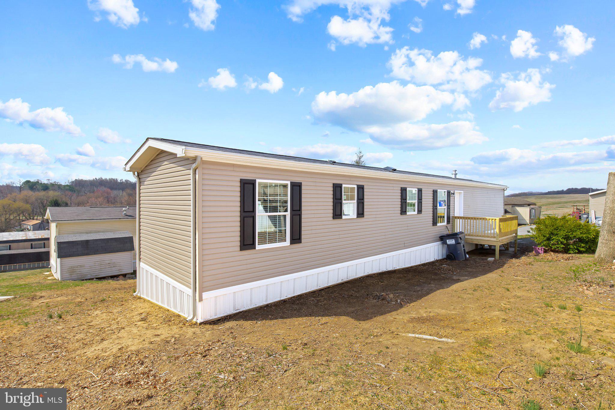 Newly Constructed 3-Bedroom Commodore Home in Southland Hills MHP – One of Lancaster County’s Most Affordable Communities!
Welcome to 17 Ashton Dr, a brand-new, thoughtfully designed home nestled in the peaceful and scenic Southland Hills Mobile Home Park—a community known for offering one of the lowest lot rents in all of Lancaster County, making comfortable living truly affordable.
This modern 3-bedroom, 2-bathroom Commodore home is perfect for those seeking style, efficiency, and tranquility. The open-concept living space flows seamlessly into a beautifully appointed kitchen and dining area, complete with energy-efficient appliances, abundant cabinetry, and sleek finishes—ideal for everyday living and entertaining alike.
The private primary suite features a full en-suite bathroom, offering a quiet retreat at the end of the day. Large windows throughout the home provide plenty of natural light and showcase the picturesque farmland views that surround this inviting community.
Located just a mile from the Enola Low Grade Rail Trail, outdoor enthusiasts will enjoy 29 miles of scenic trails along the Susquehanna River—perfect for hiking, biking, and wildlife watching. Conveniently situated just 10 minutes from Quarryville and Willow Street, and 20 minutes from Lancaster City, you’ll have quick access to shopping, dining, and entertainment, while still enjoying the calm of country living.
Don’t miss your chance to own a brand-new home in a quiet community with one of the lowest lot rents in the county. Schedule your private tour today!