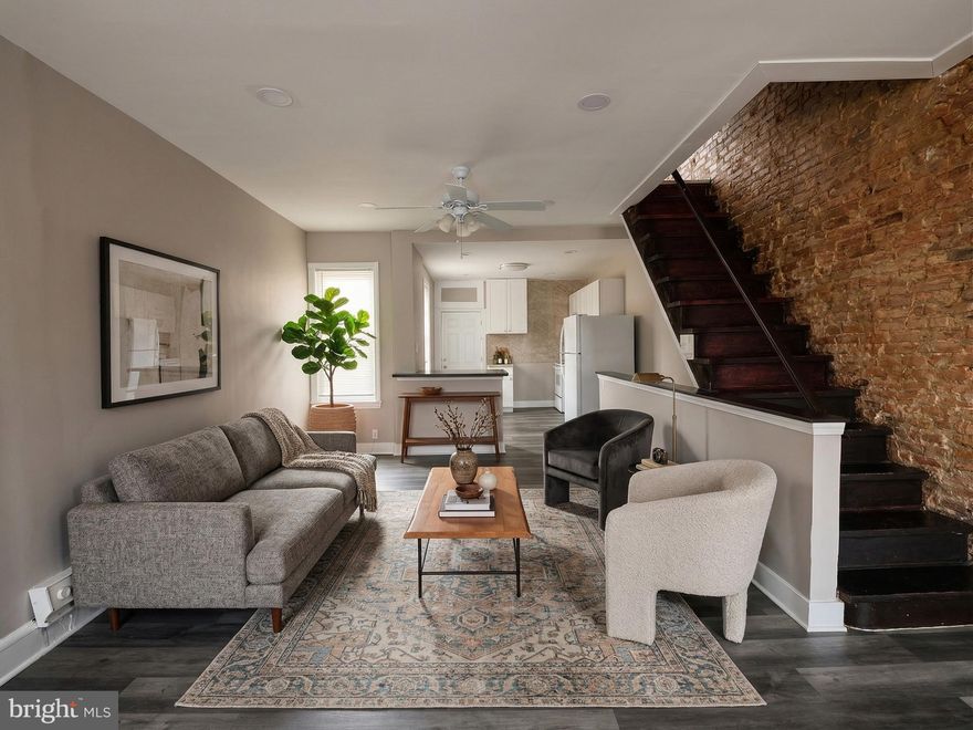 Discover the perfect blend of historic character and modern updates at 455 N Farson Street. This 3-bedroom, 1-bathroom rowhome is a standout investment opportunity or an ideal starter home for a buyer looking for stylish, low-maintenance living. The interior features durable, brand-new vinyl flooring throughout and striking exposed brick walls that give the space a trendy, industrial feel.

The home welcomes you with a classic front porch, perfect for enjoying the neighborhood atmosphere. Situated in a highly convenient location, you are just a short walk from the green spaces and recreation at Mill Creek Park. The property is also ideally positioned near local restaurants, cafes, and essential shopping, ensuring strong tenant appeal and a high walk score. Whether you are looking to add a high-character asset to your rental portfolio or find a move-in-ready home with unique architectural details, this West Philly gem is a must-see.

*Some photos have been edited and staged by AI