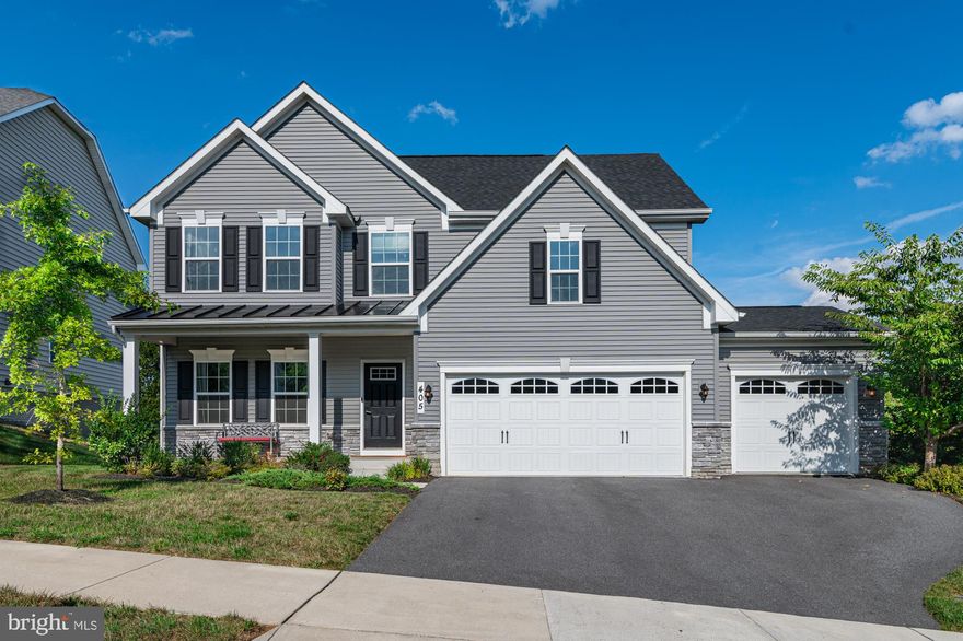 Don’t miss this beautifully upgraded Genoa model, ideally set on a wooded lot in desirable Brunswick Crossing and offering a sought-after main-level primary suite, 3-car garage, and exceptional living space throughout. Gorgeous hardwood floors extend across the entire main level, where natural light filters beautifully through the trees and creates a warm, inviting atmosphere from the moment you enter. With its private, leafy views and elevated setting, this home truly feels like a treehouse retreat.

Thoughtful custom details are found throughout, including updated light fixtures, refreshed kitchen and bath hardware, and fresh paint. The gourmet kitchen features white cabinetry, upgraded GE stainless steel appliances, and a sleek convection range. A large center island opens seamlessly to the spacious family room and sunny morning room, with access to the expansive 12x20 Trex deck overlooking the lush wooded backdrop. The formal dining room provides wonderful space for holiday gatherings, while also offering flexibility as a main-level office. The serene primary bedroom suite offers a view of trees through its many windows, a lovely bath and large walk-in closet.  A practical mudroom and laundry room complete the main level.

Upstairs, you’ll find three generously sized bedrooms, including the bonus bedroom upgrade that comes with the 3-car garage version of this home, along with a large loft space perfect for a second family room, teen hangout, or additional work-from-home area. Cat5 outlets are located throughout the home.

The Genoa model is known for its depth and width, and this home’s basement delivers with over 1,600 square feet of additional space. The bright and spacious rec room features patio doors leading to the private backyard, along with a full bath and two additional rooms ready to be finished to suit your needs—media room, office, hobby room, guest space, or more. A concept hardscape rendering has been included in the photos to help showcase the possibilities for this serene backyard setting.

Come experience all that Brunswick Crossing has to offer—a true staycation lifestyle with resort-style pool, tennis, fitness center, beach volleyball, soccer field, miles of walking trails woven throughout the community, a community garden, and more. The Marketplace is well underway, with a grocery store and several restaurants already in place. Brunswick also offers a MARC train station less than a mile away, plus convenient commuter routes to Frederick, Washington, D.C., and Baltimore.

Enjoy the natural beauty and recreation of the C&O Canal, Harpers Ferry National Historical Park, and nearby wineries, all just a short drive away. This beautifully upgraded home offers space, privacy, convenience, and an exceptional community lifestyle—come make it yours before someone else does!