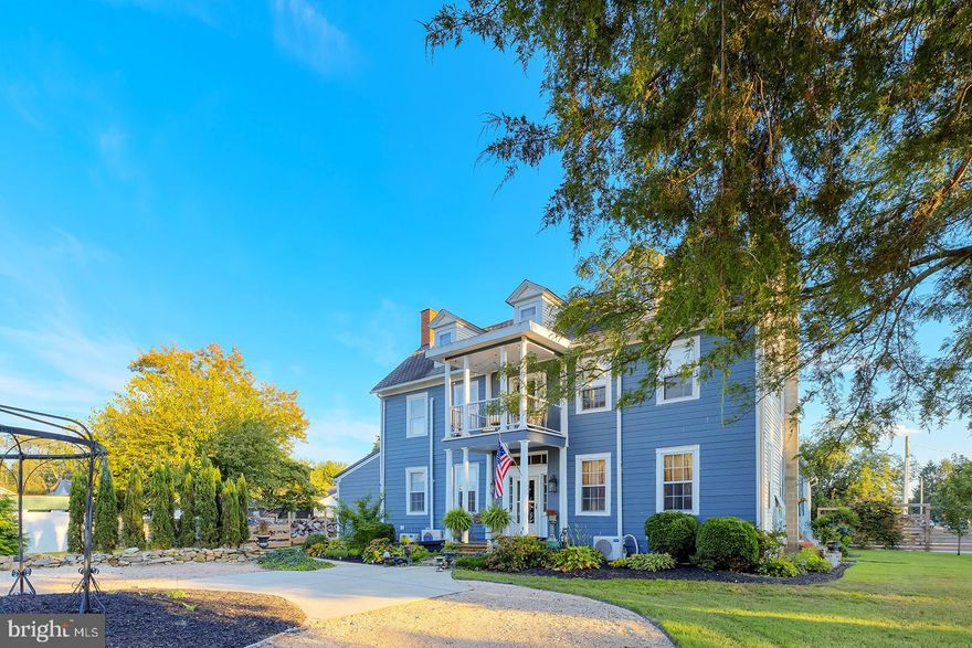 History comes full circle at Egglington Hall (c. 1794), an extraordinary estate anchored by a beautifully restored Federal-style Main House set on a sweeping, landscaped expanse near downtown Milford and recognized on the National Register of Historic Places. This remarkable 5,500-square-foot residence offers 4 bedrooms, 3.5 bathrooms, and multiple fireplaces, blending historic elegance with modern comfort. A stately circular driveway and expansive front lawn create a grand first impression, while inside, soaring 10-foot ceilings and a dramatic three-story staircase set the tone. The chef’s kitchen is thoughtfully appointed with stainless steel appliances, granite countertops, gas range, bricked warming drawer, center island, morning room, and a wet/coffee bar with separate ice maker. The foyer opens to a formal living room, and French doors lead to a wheelchair-accessible main-level bedroom with ensuite bath featuring a roll-in shower. Upstairs, the magnificent primary suite showcases painted wood floors, a fireplace, and a spa-inspired bath with soaking tub, oversized step-in shower, dual vanities, and a second fireplace, along with an additional bedroom, full guest bath, and balcony overlooking the front grounds; the third floor offers a spacious fourth bedroom or flexible living space. Outdoors, sliding doors open to a rear brick patio with koi pond, lush gardens, covered patio, outdoor shower, and a screened kasbah-style dining area with ambient lighting. An above-ground pool with raised deck enhances the resort-like setting, while a separate pool house—partially finished with concrete flooring below and engineered wood above—offers potential as an accessory dwelling unit with space for a future kitchen and bath. Solar panels add energy efficiency to this rare offering, presenting exceptional versatility as a multi-generational home, event venue, vacation rental, or investment opportunity—an iconic estate ready to begin its next chapter.
Listing is for Main house only and is subject to Town of Milford subdivision hearing and approval on March 12, 2026.