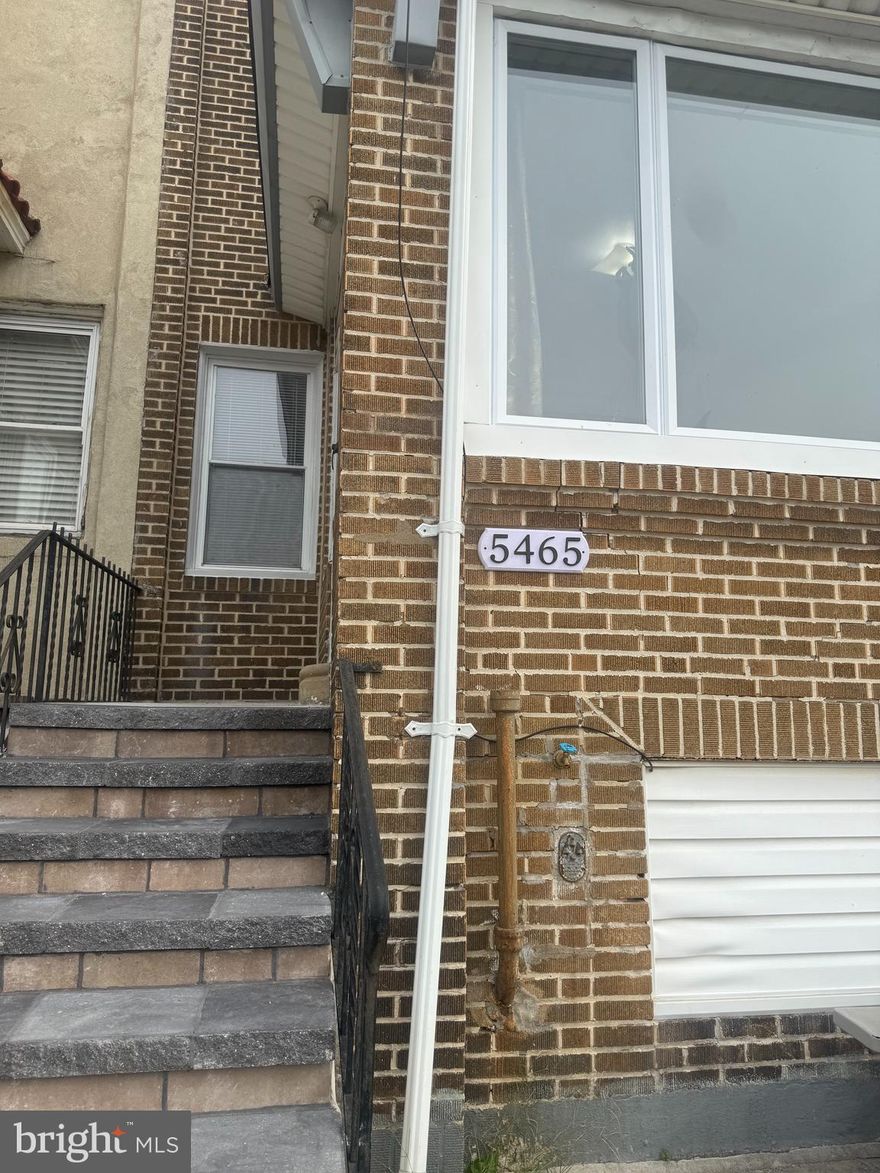 Welcome to 5465 Upland Way.  This 3 bedroom 1.5 bathroom row is ready for it's next tenants.  Brand new concrete steps and a sitting area greet you.  It's been lovingly cared for with a fresh coat of paint and clean, bright interior.  You'll immediately feel the natural light as you enter the home.  It's neutral appeal will work with any decor of the next renter.  Enjoy entertaining or just relaxing at home in the large living and dining room.   The kitchen is complete with stainless steel appliances and a back room.  Upstairs are 3 generously sized, freshly painted bedrooms.  The full bathroom is full of natural sunlight from the skylight.   A full walk out basement is a great storage or play space complete with a half bath and included laundry.  There is a park directly across the street and off street parking.  Schedule your showing today.