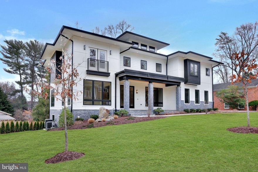 Presenting an extraordinary new luxury home in the heart of McLean, over 8,000 sq ft crafted by the renowned A.R. Design Group and thoughtfully designed by Hallstrom and Associates. This masterpiece combines impeccable craftsmanship with forward-thinking design, where every detail has been meticulously considered—from the unseen structural enhancements to the finest designer finishes.

This home is built with superior insulation, soundproofing, and structural integrity, ensuring long-term durability and comfort. Hidden details like foam-sealed overhangs and expertly sealed connections enhance efficiency, while extensive soundproofing provides tranquility throughout. Every aspect of the construction reflects a commitment to quality and comfort that extends beyond what’s visible.

The interior design is equally impressive. The gourmet kitchen, complete with a separate catering kitchen, features professional-grade JennAir appliances, four ovens, a griddle, a pot filler, and quartz countertops known for their durability and elegance. Floating shelves and a counter-depth refrigerator add a sleek, modern touch. The thoughtful addition of both a formal and informal powder room ensures convenience for everyday living and entertaining.

The grand living and entertaining spaces are designed for both comfort and style. With layered lighting, accent lighting, and built-in speakers, the ambiance can be tailored for any occasion. The home also includes a future-ready elevator shaft, allowing for easy conversion to accommodate changing needs over time.

The bedroom suites are designed as private retreats. Every bedroom includes a walk-in closet and a beautifully designed ensuite bath, each with unique, high-end tile selections. The primary suite is a true sanctuary, featuring a private wet bar, custom LED ceiling, a spacious walk-in closet, and a spa-inspired bath with a steam shower, body jets, and a Kohler washlet.

This home is equipped with cutting-edge smart home technology and energy-efficient systems. Multiple HVAC zones provide customized climate control, while 60+ smart dimmers and LED lighting enhance convenience and energy efficiency. Passive heat technology allows TV placement closer to the fireplace without the risk of heat damage—an example of the thoughtful attention to detail throughout the home.

Outdoor living is equally well-considered. The property offers ample space for future customization, including a pool, fire pit, and expanded landscaping. The three-car garage includes a dedicated dog wash station for added convenience. The walkout lower level, designed to maximize natural light, creates a seamless connection between indoor and outdoor living spaces.

Located in sought-after McLean, this home offers both privacy and convenience, with easy access to top-tier schools, dining, and shopping. This is more than a home—it’s a statement of refined living. Contact us to schedule your private tour before it hits the market!