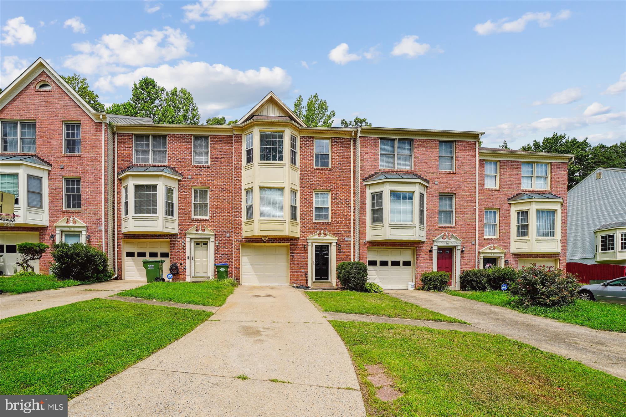 Now Available with $0 Security Deposit! Beautiful 3 Bedroom / 2.5 Bath Brick-Front Townhome in a Prime Location! Step into comfort and style with luxury vinyl flooring throughout both the first and second levels, including the convenient main-level powder room. The spacious living area features a charming bay window that flows seamlessly into the open-concept living and dining space—perfect for entertaining. Enjoy cooking in the sun-drenched kitchen, complete with a center island and a cozy eat-in breakfast area. The primary suite offers a peaceful retreat with dual vanities, a soaking tub, and a separate shower. Two additional well-sized bedrooms share a spacious hall bath. Step out onto the deck just off the dining area and enjoy a fully fenced backyard—great for outdoor relaxation or play. Additional highlights include an in-unit washer and dryer and a convenient location just minutes from Quantico, VRE, and major commuter routes.