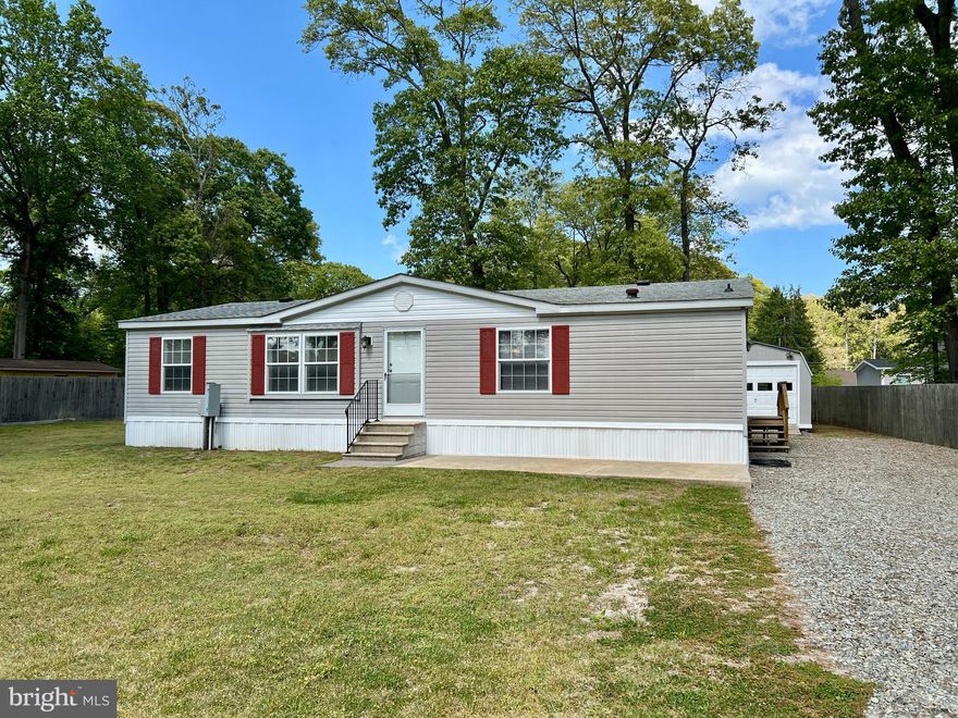 Just listed, a well-maintained double-wide home that offers three bedrooms and two bathrooms, located only a few minutes from the beaches. With an open floor plan, a spacious primary suite featuring a bath and walk-in closets, stainless steel appliances, washer and dryer, garage, and patio, the property sits on nearly half an acre near Lewes, Rehoboth Beach, and Cape Henlopen State Park. Free from any active homeowner’s association, it's ideal for a relaxing beach retreat. Ample parking and close proximity to all local attractions make this home a fantastic opportunity. It is priced to sell. Call for an appointment today.