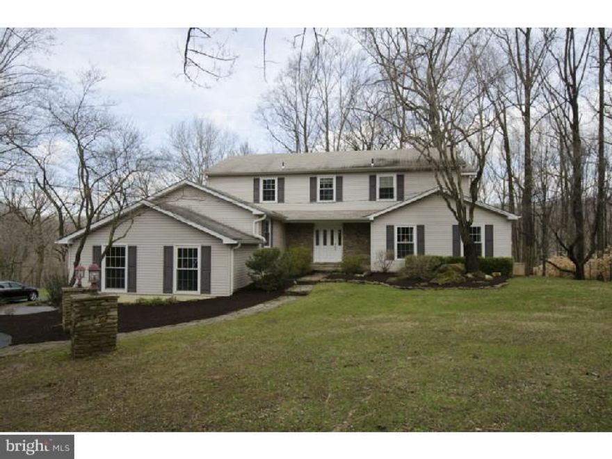 Wonderful 5 bedroom, 4 bath mini estate situated on a very private and picturesque 2.30 acre lot in Tredyffrin Township!  Inviting exterior accents including stone pillars at entrance, and a stone walkway.  Enjoy special interior features such as hardwood flooring, a spectacular custom Library complete with Granite Wet-Bar and Sub-Zero Wine Cooler, a secluded first floor Office, and a first floor Bedroom/In-law Suite with a private entrance and full Bath.  A sunny and bright Kitchen opens to the Family Room with fireplace and direct access to the newly remodeled 800 sq. ft. Wrap-Around Composite Deck.  Convenient 1st floor Laundry Room.  The 2nd floor features 4 light filled Bedrooms and updated Master and Hall Baths.  Every window boasts scenic views of the large, open, Deer-Fenced Yard with mature trees overlooking a nature preserve.  Finished Lower Level, with a Recreation Room/Game Room, Mud Room with Outside Entrance, a new Full Bath, a Storage Room and a Play Area, and access to the 2-car attached Garage.  Professionally Landscaped, House Generator, Gutter Guards, Water Purifying System, Fenced Vegetable Garden, Play House/Potting Shed with an Historic Forge.  This unique property is serviced by award winning Tredyffrin-Easttown School District.