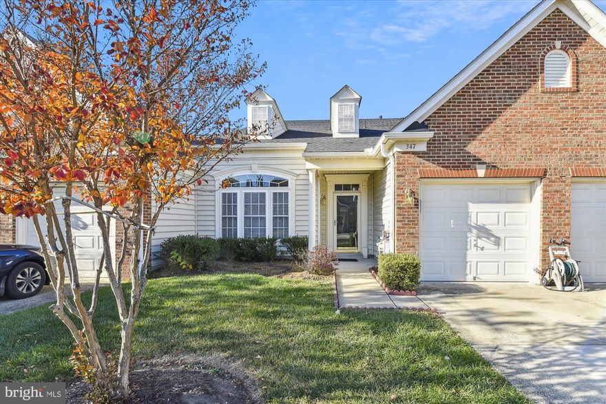 Welcome Home to the Hamlets at South River Colony. Built by NV Homes in 2001 this is an original owner who has meticulously maintained and improved along the way. This attractive 55+ Active Living Townhome Features a 2-Story  residence with a colossal size Owners Suite comfortably on the First Level with a bright and clean beautiful bathroom dual vanities and a glass enclosed walk-in shower bath. The main level is bright with a new Transom window from Thompson Creek. The inviting Living room features a two-sided gas fireplace with a vaulted ceiling with close proximity to the Formal Dining Room step inside the Gourmet Kitchen with breakfast room or walkout to your private deck overlooking a large area of open green space -- if it's too sunny, use the retractable awning. Upper level offers a open space overlooking the living room with ceiling fan and 2 additional large bedrooms. The convenient walk-in laundry area with washer and dryer is on the main level with a powder room, storage closet and access to the 1 car garage with opener. Sellers have recently replaced the roof and replacement of the HVAC (natural gas furnace) also replacement of the refrigerator and the stove too, the 42" cabinetry provide all the kitchen space you need. Residents of the Hamlets also have access to the master-planned amenities of South River Colony. Golfers will love having easy access to the Golf Club at South River that's about a mile away. The community is in close proximity to Annapolis Town Centre as minutes to downtown Historic Annapolis as well as major transportation routes to Baltimore and to downtown Washington DC...a truly vibrant 55+ community to call home!