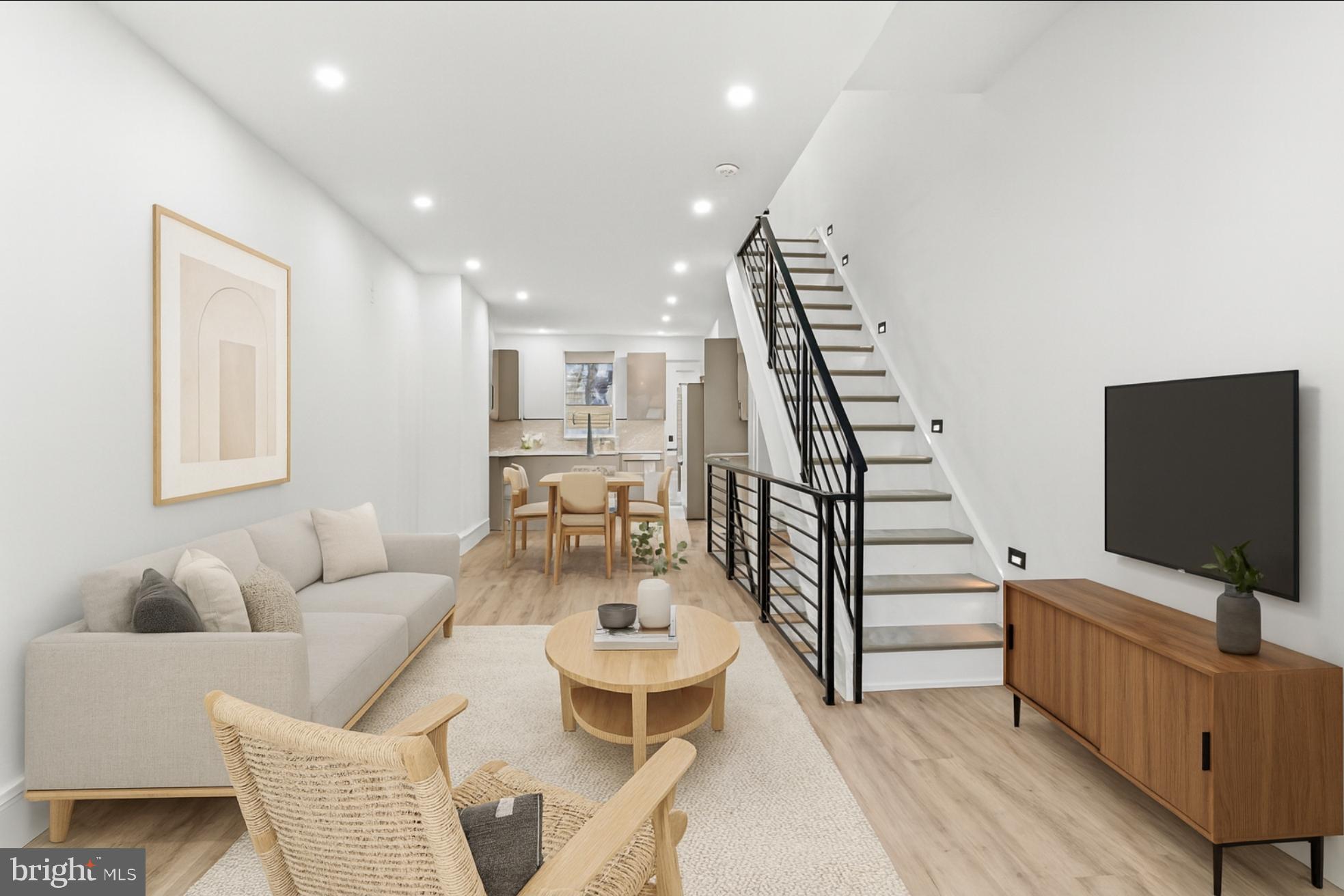 **Contemporary Urban Living at its Finest: 3-Story Designer Home with Skyline Views in the Heart of Point Breeze** Welcome to 2139 Sears St, a newly built 3-story architectural masterpiece that defines modern luxury living. With 3 bedrooms, 3 bathrooms, and a sprawling 1960 square feet of meticulously designed space, this property is a truly a refined style of development. As you step inside, you'll immediately notice the open concept layout, accentuated by soaring 9+ ft ceiling heights that create an airy and inviting atmosphere. The wide plank floors and floor-to-ceiling windows further enhance the contemporary aesthetic of this home, allowing natural light to flood every corner. The attention to detail is evident throughout, with herringbone tile designs adding a touch of sophistication. The kitchen is a chef's dream, featuring top-of-the-line appliances and ample counter space for culinary endeavors. One of the standout features of this home is the rooftop deck that offers breathtaking skyline views. It's an ideal spot for hosting gatherings or simply unwinding while taking in the cityscape. The primary bedroom is a true retreat, complete with a walk-in closet that will satisfy even the most discerning fashion enthusiast. The large primary bathroom is a spa-like oasis, boasting a soaking tub strategically placed between floor-to-ceiling windows, allowing you to relax and enjoy the view in ultimate comfort. The convenience of this location cannot be overstated. Wharton Square Park, a beautiful urban oasis, is just a block away, providing a serene escape from city life whenever you desire. But that's not all. This property also offers a finished basement with a full bath, adding versatility to the space and making it an ideal area for a home office, guest suite, or entertainment room. 2139 Sears St represents the pinnacle of contemporary urban living in Point Breeze.