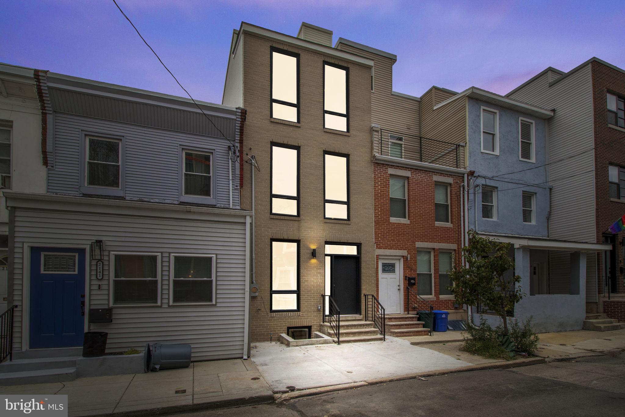 **Contemporary Urban Living at its Finest: 3-Story Designer Home with Skyline Views in the Heart of Point Breeze** Welcome to 2139 Sears St, a newly built 3-story architectural masterpiece that defines modern luxury living. With 3 bedrooms, 3 bathrooms, and a sprawling 1960 square feet of meticulously designed space, this property is a truly a refined style of development. As you step inside, you'll immediately notice the open concept layout, accentuated by soaring 9+ ft ceiling heights that create an airy and inviting atmosphere. The wide plank floors and floor-to-ceiling windows further enhance the contemporary aesthetic of this home, allowing natural light to flood every corner. The attention to detail is evident throughout, with herringbone tile designs adding a touch of sophistication. The kitchen is a chef's dream, featuring top-of-the-line appliances and ample counter space for culinary endeavors. One of the standout features of this home is the rooftop deck that offers breathtaking skyline views. It's an ideal spot for hosting gatherings or simply unwinding while taking in the cityscape. The primary bedroom is a true retreat, complete with a walk-in closet that will satisfy even the most discerning fashion enthusiast. The large primary bathroom is a spa-like oasis, boasting a soaking tub strategically placed between floor-to-ceiling windows, allowing you to relax and enjoy the view in ultimate comfort. The convenience of this location cannot be overstated. Wharton Square Park, a beautiful urban oasis, is just a block away, providing a serene escape from city life whenever you desire. But that's not all. This property also offers a finished basement with a full bath, adding versatility to the space and making it an ideal area for a home office, guest suite, or entertainment room. 2139 Sears St represents the pinnacle of contemporary urban living in Point Breeze.