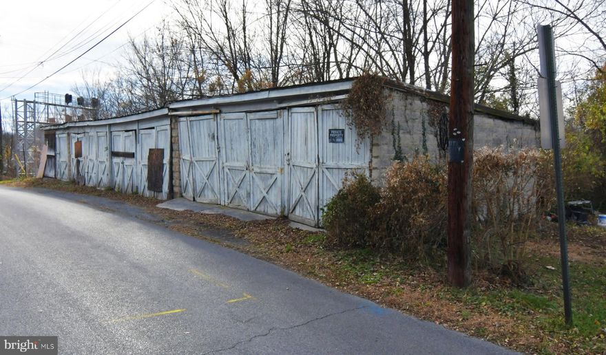 EASILY AFFORDABLE! Near downtown Martinsburg and convenient to I-81. Four lot numbers totaling .35 acre with existing storage buildings, parking area. Sold strictly as-is, where is. Cash preferred. Buyer responsible for verifying water and sewer availability and whether lot is suitable for buyer's intended use.  May be subject to tap fees. Also, may be subject to new impact fees for houses, multi-famlly and mobile homes that  must be paid before a building permit is issued. The Eastern Panhandle is one of the fastest growing areas of West Virginia.  Residents of Martinsburg and Berkeley County are attracted to the small-town atmosphere, employment opportunities, restaurants, shopping, services, medical facilities,  a revitalizing downtown, and access to major roads, the MARC train and Amtrack. Lot sizes approximate. Tax ID numbers for Lots 6 & 7 06 0015001500000000, for Lots 8 & 9 06 150014000000000. 
Assessment and taxes reflect total for all the lots.