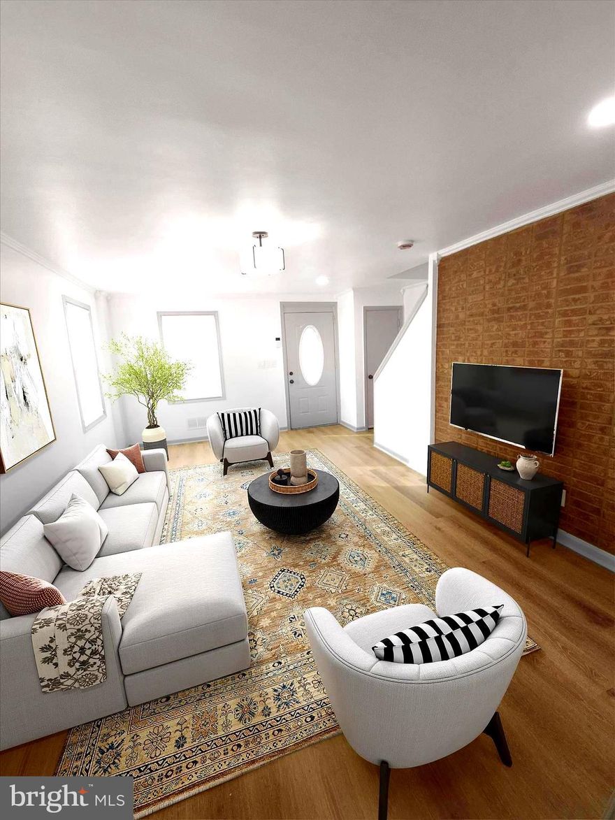 Fully renovated in 2025 end-of-group townhome in Baltimore.  3 bedrooms, 2 full bathrooms, end-of-group (meaning more natural light and potentially more outdoor space on one side.  Private 2-car parking pad in the rear – a significant advantage , eliminating the hassle of street parking. Upgraded flooring throughout the home, Recessed lighting throughout and 4 ceiling fans indicate good illumination and airflow in various rooms. Each bedroom also has a ceiling fan with light and recessed lighting.  Modern kitchen with desirable features such as soft-close drawers, wood cabinets (offering durability and a classic look), a built-in microwave (saving counter space), a backsplash (protecting walls and adding style), and an LG refrigerator with an icemaker (a popular and convenient appliance). The pass-through from the kitchen to the dining room enhances flow and interaction. Upstairs bathroom with ceramic tile (durable and water-resistant) and a new vanity. The lower level has a full bath with a shower, adding convenience and flexibility.  Steel storm doors for added security, exterior lighting for safety and curb appeal, and fenced front and rear yards – great for privacy, children, or pets.  A clubroom that leads to the lower-level full bath could serve as a recreation room, home office, or guest space. Rear glass block windows in the lower level provide natural light while maintaining privacy.  Dining room with a ceiling fan, wood trim windows adding character, and energy-efficient vinyl windows. Pull-down attic stairs offer convenient access to storage space.  M&T $7500.00 grant available could significantly reduce your upfront costs or be used towards closing expenses. You would need to verify the eligibility requirements and terms of this grant with the listing agent or M&T Bank.  Benefits of an End-of-Group Townhome: More Natural Light: Typically, end units have windows on an extra side, allowing for more daylight throughout the home.  Having only one shared wall can lead to more peace and quiet.  Furnace replaced March 2025, washer/dryer purchased in 2024