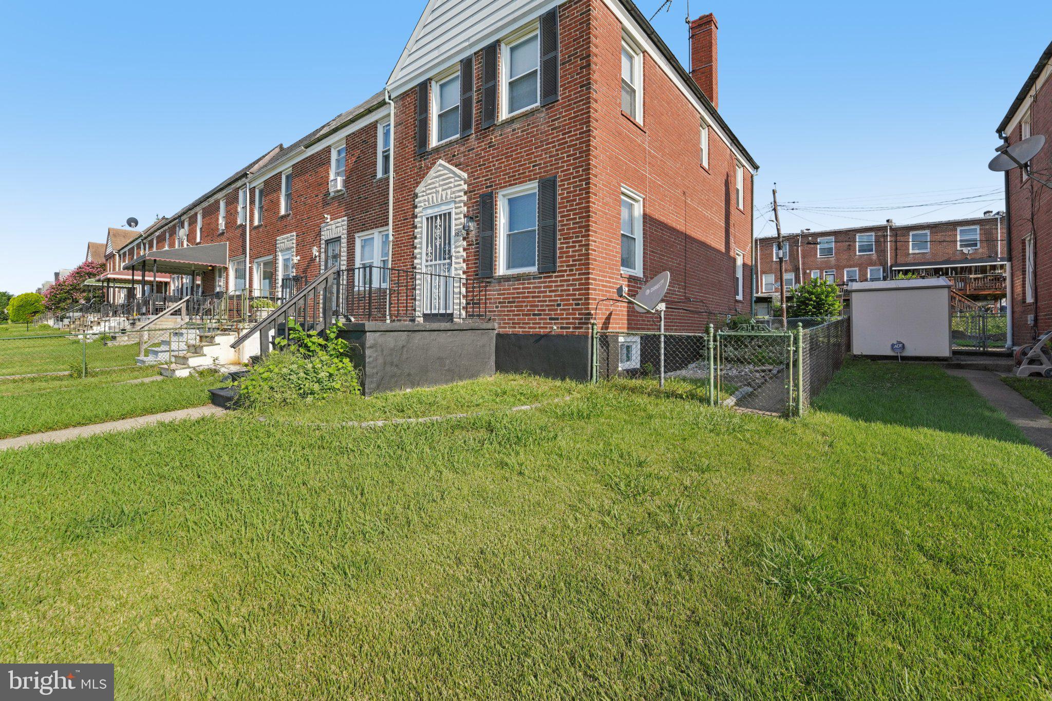 Experience the best of city living in this completely renovated (2025) 3-bedroom, 2-full bathroom end-of-group townhome in Baltimore. This exceptional unit offers enhanced natural light and a rare private 2-car parking pad. Inside, you'll find upgraded flooring, recessed lighting, and ceiling fans in every room. The chef's kitchen features soft-close drawers, wood cabinets, a built-in microwave, backsplash, and an LG refrigerator. Both full bathrooms are updated, with ceramic tile and new vanities.
The versatile lower level includes a full bath and a clubroom, perfect for a rec room or home office. Enjoy outdoor privacy with fenced front and rear yards, plus enhanced security with steel storm doors and exterior lighting. Recent major updates include a new furnace and central air (March 2025), hot water heater (2024), washer/dryer (2024), and a 6-year-old roof. Don't miss the opportunity for a potential $7,500 M&T grant (buyer to verify eligibility).