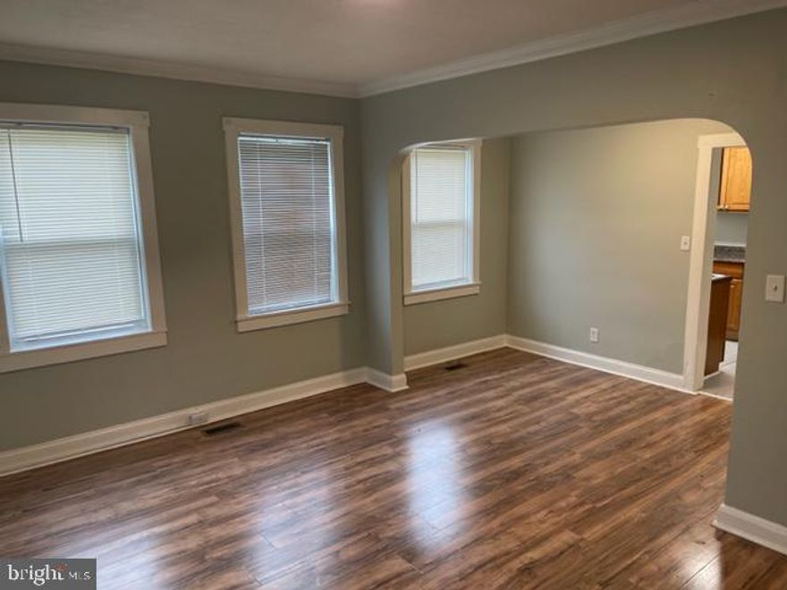 SPACIOUS UPDATED 2 BEDROOM 1 BATH APARTMENT! This unit is located in an 8 unit building and features all laminate wood flooring, spacious living room, separate dining area, updated kitchen with ss appliances, newer HVAC with central AC, and in-unit washer and dryer. Located steps from Bengie's drive through, shopping, and restaurants!