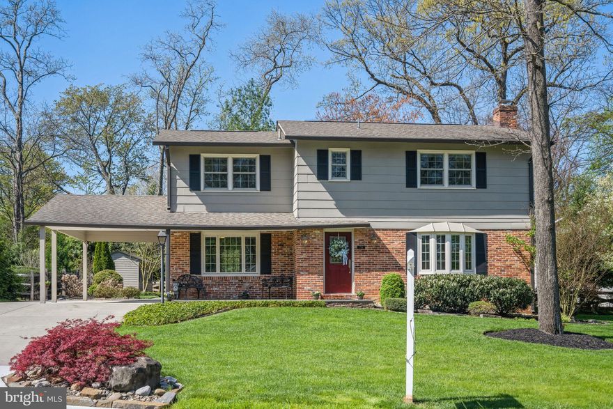 Classic elegance and PRIDE OF OWNERSHIP are at its finest!  Outstanding maintenance from the original owners.  The sellers did only top of the line upgrades.  The house grandly stands on a beautiful corner of a cul-de-sac and is framed with extensive landscaping.  The foyer has beautiful moldings and flows to a large formal living room with a lovely Anderson bay window.  The foyer leads straight ahead to an updated formal powder room.  The kitchen is to the right and the dining room to the left.  The kitchen was remodeled with an island, granite counters, and a pass through to the family room.  It exits to a beautiful new Trek deck that is surrounded by lovely English flower beds painted in seasonal colors.  A custom wood storage shed rests on the far left corner of the backyard.  A top loading washer and dryer sits in a closet in the kitchen next to the sliding door.  There is a wall oven and cooktop in the island for easy cooking.   The family room is off the kitchen and has a brick hearth and a brand new gas fireplace insertion.   Drink your cup of tea by the cozy fireplace and watch mother nature unfold.  The first floor just screams for entertaining.    The top floor offers 3 bedrooms plus a master bedroom.  There is a spectacular hall bath with a granite vanity top.  The master bedroom has an opulent master bath fit for a king or queen.  Sellers have spared no expense on new electric balloon shades, Anderson windows and appliances throughout.  The lower level is finished with a huge fireplace and a full bath.  There is a second laundry room and storage area.  Rarely is a house of this statue available in this sought after neighborhood.  There is a community elementary school and playground.   This is the perfect house to call home!