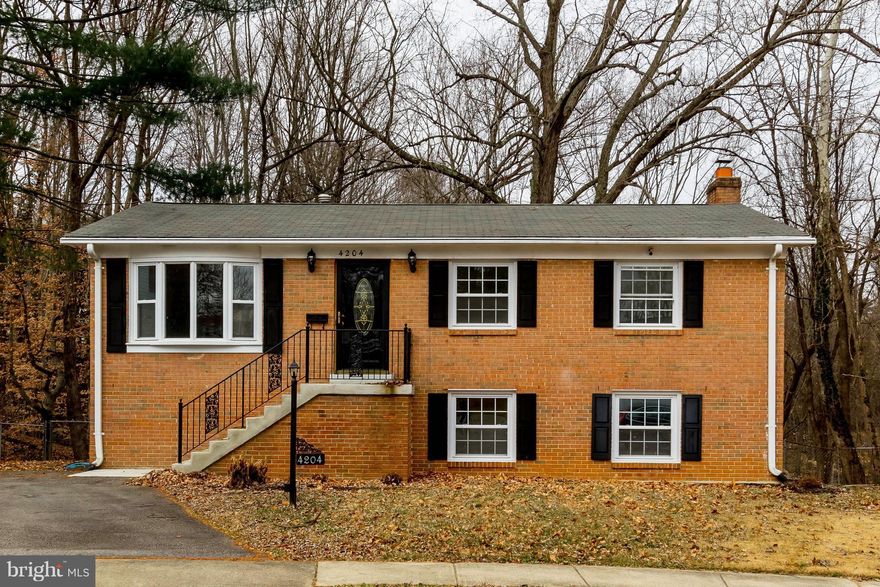 GREAT HOME on cul-de-sac, fenced rear yard, new carpeting on stairs, lower level, hard woods redone, new floor in kitchen, fresh new paint, young roof, appliances, counter tops, windows, large lot, peaceful view from large deck that backs to a dedicated wooded area, 4 person hot tub,new lower level rear door, light filled home & much more.  Did I say, GREAT HOME at a great price? VIDEO TOUR COMING