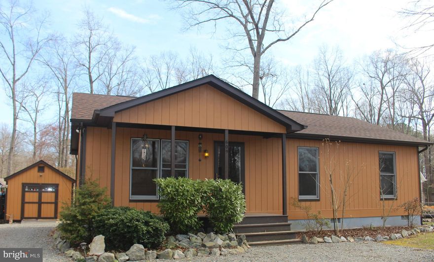 Big, Beautifully Landscaped Yard Compliments this 3 Bedroom 2 Bath Rambler in Amenity Filled Lake Caroline.  New 12 x 20 Shed in 2017! New Roof and Gutters in 2017! New Range, Dishwasher, Washer & Dryer 2017! Pest Treated Insulation and Vapor Barrier Installed in Attic in 2018! Insulation & Vapor Barrier Installed in Crawl Space in 2018! New Carpet! Fresh Paint! MOVE IN READY! Enjoy Beautiful Lake Caroline in this Home Located on a Quiet Section of Lake Caroline Drive. Walking Distance to Boat Dock. 1 Mile from Main Beach & Swimming Pool.