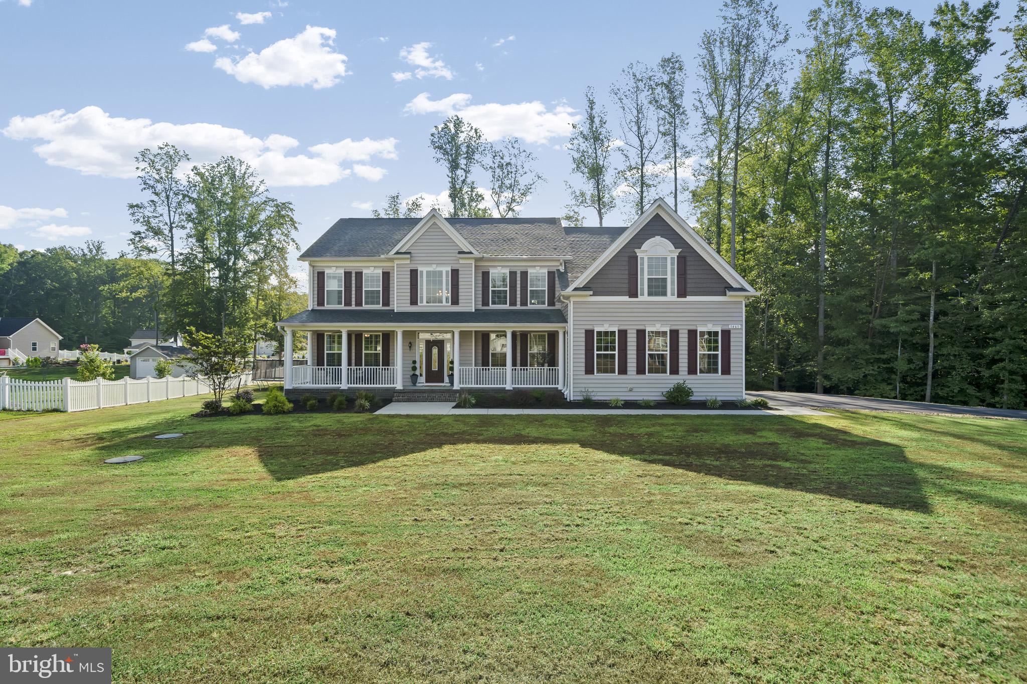Come check out this gorgeous colonial tucked away in the highly desired Ponds Wood Landing. This is the Willow model by Quality Built Homes. This beautiful 6,100+ sqft home sitting on 1.4 acres offers upgrades throughout. As you enter, you are greeted by a stunning two story foyer with beautiful chestnut hardwood floors. Just off the foyer, you have a quiet living room and a formal dining room. The main floor has an open floor plan with 9ft ceilings throughout. Elegant plantation shutters covering the first floor windows. Large family room with a gas fireplace. On one side of the family room there is a study/office which has built-ins with soft closing drawers and a Murphy bed. The other side opens to your expanded gourmet kitchen which is equipped with recessed lighting, granite countertops, slate GE appliances, 5 burner gas cooktop, double ovens, under cabinet lighting, soft closing cabinets/drawers, walk in pantry, a desk area and an oversized island that flows seamlessly into the eating area. The upper level has 4 bedrooms that all include ceiling fans and blackout blinds. There is an additional bonus room (potential for 6th bedroom). In the primary suite there are motorized blackout blinds and an added sitting area. Through the sitting area there is the master bath and a breathtaking walk-in closet with custom built-ins. The primary bath offers an expanded tiled shower, soaking tub, and dual vanities. Upstairs laundry has a wash sink and shelving. The lower level is mostly finished. It has a guest bedroom and full bath. The lower rec room has a wet bar for entertaining. The unfinished portion of the basement offers additional storage and added laundry hook ups. The driveway has been enlarged and paved. There is extra storage in the oversized 2.5 car garage.