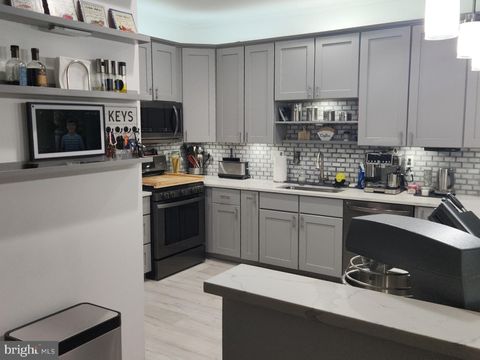 Photo of 8254 Academy Road #8, ELLICOTT CITY, MD 21043 (MLS # MDHW2067626)