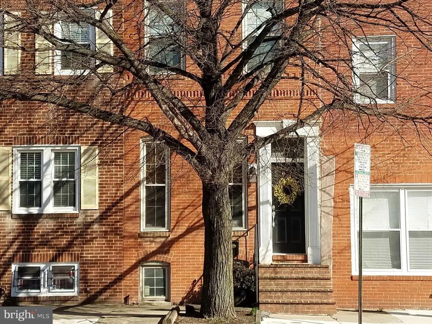 Lovely home on a prime block in Federal Hill.  Lots of interior living space plus 2 Decks! The roof top deck has a wet bar. Parking pad in back for 2 cars. Don't miss this home it has so much to offer!!
