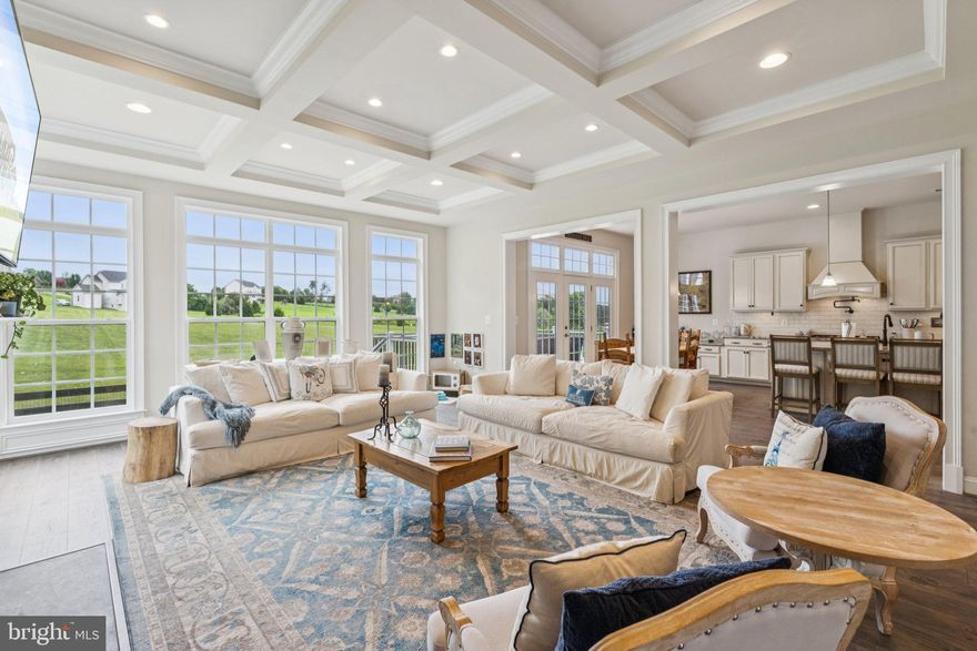 **OPEN SUNDAY, 3/17 1-3PM AND JUST REDUCED!**Nestled in the prestigious Highlands community in Western Loudoun, this exquisite 5-bedroom, 5.5-bathroom residence offers a harmonious blend of luxury and comfort, perfect for those seeking an elevated lifestyle. Built in 2020, this traditional-style home showcases impeccable craftsmanship and modern amenities, ensuring a living experience that is both sophisticated and inviting. Step inside to discover an expansive open floor plan that seamlessly connects the gourmet kitchen, dining area, and family room. The kitchen is a culinary enthusiast's dream, featuring upgraded countertops, a spacious island, and high-end stainless steel appliances, including a double oven and built-in microwave. A large walk in pantry and walk in coat closet are the perfect places to tuck away items and keep them accessible from the kitchen and garage. The breakfast area invites casual dining, while the formal dining room, adorned with crown moldings and chair railings, sets the stage for elegant gatherings. A main level office with French doors (FIOS high speed internet is here!), a Club/Library Room and Drop Zone (currently the Wine Tasting Room) add to the many ways to enjoy living in this home. Retreat to the luxurious primary suite, complete with 2 walk-in closets and a spa-like bathroom featuring a stand alone soaking tub and a sumptuous walk-in shower. Each additional bedroom offers generous space and en-suite access, ensuring comfort and privacy for all. The mostly finished basement, with a side entrance and walkout stairs, provides endless possibilities for customization, whether it be a home theater, gym, or additional living space. The interior is enhanced by thoughtful details such as recessed lighting, hardwood floors, and cozy ceiling fans, creating an atmosphere of warmth and tranquility. A gas fireplace with a stylish mantel serves as a focal point in the family room, perfect for cozy evenings spent with loved ones. The lower level includes a bedroom with egress, a full bathroom, Rec Room plus a Game Room. Plenty of unfinished space to add more living area  or use for storage. The lower level has also been outfitted with a second location for washer/dryer hookups as well as for a wet bar or second kitchen. Outside, the property spans 3 acres, offering a partly wooded lot that provides both privacy and a picturesque setting. No need to worry with a whole home auto-transfer generator. Enjoy breathtaking mountain views from your deck, ideal for entertaining or simply unwinding in nature's embrace. The front and rear yards are beautifully manicured, inviting outdoor activities and relaxation. With a side-entry attached garage accommodating three vehicles plus an extended driveway for additional vehicles, convenience is at your fingertips. This home is not just a residence; it's a sanctuary that embodies luxury living in a serene environment. Located off of all paved roads, this home is minutes to Route 7, Bear's Den/Appalachian Trail, downtown Purcellville, restaurants, wineries, breweries, Shenandoah River, organic farm stands, schools and much more. 25 minutes to Leesburg and 40 minutes to Dulles Airport. Enjoy the annual Round Hill or Bluemont Festival, Purcellville's Halloween Party, holiday parades, music and art/wine and food festivals, take in a local game of baseball at historic Fireman's Field or roller skating at Bush Tabernacle. So much to do! Experience the perfect blend of convenience, local events, location, elegance and comfort.
