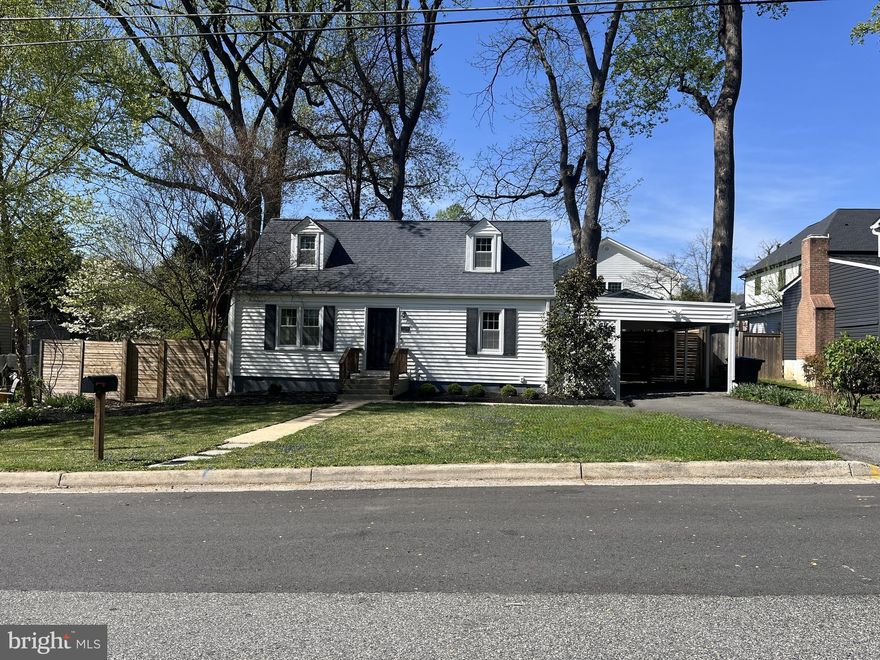 MAJOR PRICE REDUCTION:  Adorable, sunny move-in ready cape cod with main level open concept flexible floor plan and recessed lighting.   Three ceiling fans on main level as well as a main level bedroom.  2016 kitchen renovation includes stainless appliances; quartz countertops, 42 inch cabinets, oven hood, gas cooking and kitchen island for dining/food prep.  Main floor bathroom renovation (2018) includes heated flooring and subway tile.  Separate laundry room with backyard access.   Backyard is fully fenced with large deck, hardscape area and wood pergola perfect for entertaining.   Backyard also has space for a garden and playset.  Other amenities include a carport, utility shed with electric and built-ins and an additional attached walk-in storage shed.  New flat roofs installed April 2026 over carport, utility shed and laundry room. Original main house roof (2013) with repairs to rear roof and ridge vent April 2026; new rear gutters with gutter guards and downspouts (April 2026); HVAC (2013) new blower motor (April 2026);  Gas hot water heater and electrical panel (2021);  Newer Washer, Walls painted (April 2026). Crawl space insulated and vapor barrier installed 2021.    NOTE:  some of the listing photos are virtually staged and two virtually staged options are presented for the main level entry room.   WELCOME TO YOUR NEW HOME!