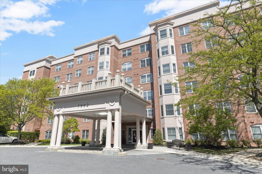 Introducing this sun-filled corner unit on the second floor in the desirable gated community of Stevenson Commons, offering two bedrooms, two full and one half bathrooms, and nearly 2,000 square feet of refined living space. A secure building lobby features a doorman desk, with elevators providing access to the private gated garage. Step into the foyer that sets the tone for the elegance found throughout, highlighted by tray ceilings, rich hardwood floors, recessed lighting, and sophisticated finishes. Open-concept living and dining areas showcase bright bay windows and provide an ideal setting for entertaining. The expansive kitchen is well-equipped with granite countertops, 42-inch cabinetry, a large center island with seating, and stainless steel appliances including a double wall oven and gas cooktop. A breakfast nook offers space for casual meals, while the inviting family room is perfect for relaxing. The primary bedroom serves as a private retreat, featuring a vanity dressing area, two closets including a walk-in, and an en-suite bathroom with a dual-sink vanity, jetted tub, and walk-in shower. The second bedroom suite includes its own private bathroom with a walk-in shower. Completing the unit are a half bathroom and a laundry room. Recent updates include a new water heater in 2024, HVAC system in 2020, and brand new carpet in the primary bedroom. The unit includes one assigned parking space in the secure garage, along with ample guest spots in the parking lot.