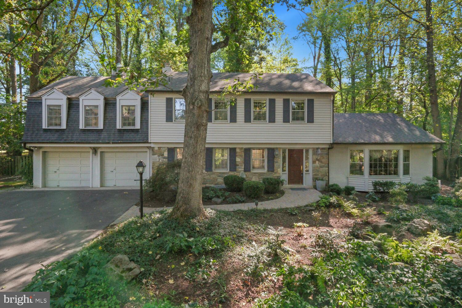 Welcome to 11313 Marcliff Road, a stunning stone-front colonial nestled in the highly sought-after Luxmanor community.
Set on a spacious, maintenance-free 0.65-acre lot, this elegant home offers five bedrooms and four and a half baths, seamlessly blending style, comfort, and modern convenience.
The bright, airy kitchen is flooded with natural light from skylights and expansive windows that frame scenic views of the surrounding landscape. It features top-of-the-line GE and KitchenAid appliances, perfect for any chef. The impressive primary suite addition boasts floor-to-ceiling windows and a luxurious ensuite bathroom, while custom built-in cabinetry enhances the storage in most bedrooms and the dining room.
The fully finished basement is perfect for entertaining, with a large recreation room, a well-equipped bar area, and an additional room with a full bath. Meticulously maintained, the home offers two separate heating and cooling zones for optimal comfort year-round.
Outside, the private backyard retreat includes a large stone patio, basketball court, and an invisible deer fence, making it an ideal space for relaxation and outdoor gatherings.
Ideally located near Tilden Woods Park, Tilden Woods Pool, and North Farm Pool, with easy access to I-270, I-495, Route 355, and the North Bethesda Metro Station, this residence offers unparalleled convenience. For entertainment, dining, and shopping, Pike & Rose, Montgomery Mall, and the Strathmore Music Center are just minutes away. Schedule your private tour today to discover the exceptional lifestyle that awaits in this remarkable home.