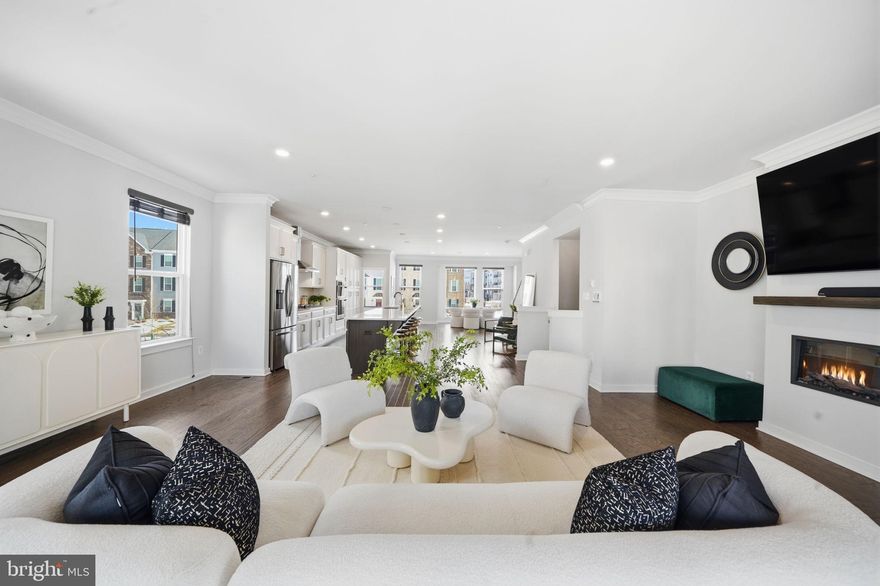 Ready.  Set.  Go!!! Want to live in the fabulous new SouthLake Community but want to avoid the wait of a custom build?  This is the home you need to see!  This 3,000+/sf, turnkey, end unit townhome is beautifully maintained and ready for immediate move in.  Complete with all of the upgrades that you would have to wait for. The ground floor comes with multi-generational ensuite bedroom/office and recreation room.  The open floor plan on the main level is perfect for entertaining complete with a fireplace for the winter and a covered balcony for summer entertaining.  The gourmet kitchen includes a 14' extended countertop complete with dishwasher, built in microwave,  oven and gas cooktop. The bedroom level has two large bedrooms for family, guests or a home office and large hall bath is perfect for family or friends.  The owner's suite is expansive and welcoming with the upgraded bedroom tray ceiling plus the grand dual shower with water closet and additional walk in closet.  This end unit homes provides the brightness of the sun while still providing privacy.  Walking distance to shopping and retail and the clubhouse.  And if that wasn't enough - all four flat screen tvs convey.