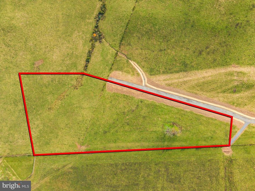 You don't have to sacrifice convenience for gorgeous views and rolling green pastures. Only minutes from town, this beautiful nearly 7 acre lot offers a chance to build your dreams. Easy to get to but hard to leave, don't let this opportunity pass you by! Additional lots available. Property lines in photo are approximate. Call for more details