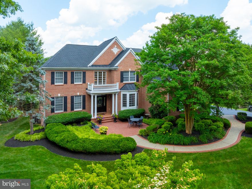 Introducing resort-style living every day at this stunning, move-in ready Hartefeld National Golf Course estate home nestled on the 10th fairway and a short walk to the clubhouse, restaurant and community pool. Boasting over 6800 square feet of luxury, this masterpiece offers 4+ bedrooms and 4.5 bathrooms, all set against a backdrop of breathtaking lighted landscape. 
Step into elegance through the brick front patio and be greeted by a two-story entryway adorned with a custom curved staircase from the 2nd level to the lower level. Hardwood floors glisten throughout the whole 1st level. From the front to the back left side of the house, the living and dining rooms exude sophistication with beautiful crown molding and chair rails. 
To the right, discover a spacious second family room seamlessly flowing into the great room and kitchen area. The great room features a wood-burning stone fireplace with a rustic reclaimed wood mantel flanked by custom built-ins, under a tray ceiling. The chef's dream kitchen boasts top-of-the-line appliances including a Wolf range and 2 ovens, a hidden separate Sub-Zero refrigerator and freezer, a built-in walk-in pantry, and an oversized granite island with a Sub-Zero wine fridge and ice maker. Two sinks and two dishwashers allow for ease of entertaining. 
Adjacent to the great room is a sunroom with beautiful marble tile and floor-to- ceiling windows offering panoramic views of the golf course, complemented by a Juliet balcony. 
The large Trex deck accessible from the kitchen or sunroom with stairs leading to the backyard is perfect for a cup of coffee or glass of wine. The 3-car newly painted garage (complete with a Tesla electric vehicle wall charger) and driveway parking for 7 additional cars ensures ample room for guests and family. 
On the 2nd level, the primary suite awaits with an oversized walk-in closet, tray ceiling with fan, and a spa-like bathroom featuring marble floors and walls, a soaking tub, and a marble spa shower with 5 shower heads and 2 speakers. Three additional spacious bedrooms, two full bathrooms and a study/office nook complete the second level. 
The walk-out lower level, spanning 2000 square feet, is an entertainer's paradise or the perfect place for an in-law suite, featuring an additional bedroom/flex-room 
with hardwood floors, a spa-like bathroom with jetted tub and separate shower, a full-size theater room with a 110-inch movie screen and soundproof faux painted walls, a wine cellar with ample entertaining space, a large home office, and tons of storage space complete with gym. French doors open to the rear stamped concrete patio and flat backyard, perfect for outdoor gatherings. 
The home features a new roof (2023) with a transferrable 50-year warranty, an A.O. Smith Vertex commercial hybrid water heater, a security system, timed exterior lights, fresh paint and new carpets. The home is move-in ready with no updates needed. Experience luxury living at its finest with this impeccable home, where every detail has been thoughtfully curated for the most discerning buyer. Owner is a licensed real estate agent.