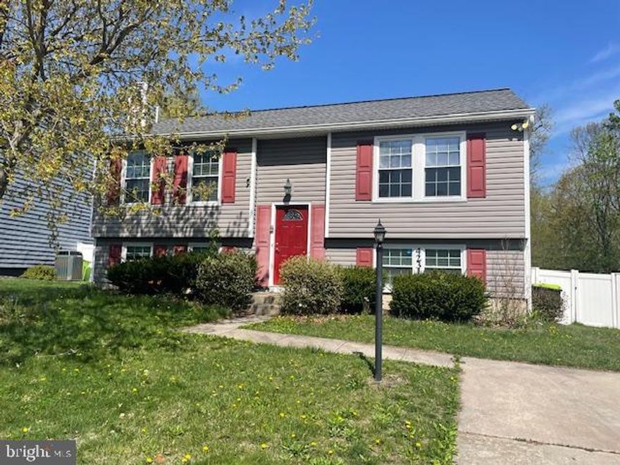 Buyers come quick! Great bi-level home in Riverside awaits! Take a look at this 3 bedroom, 2 full bath home that features a fully finished basement with 2nd kitchen! The main level has a large open living room, eat-in kitchen with stainless steel appliances. Sliders off of dining area go out to a newly refinished deck. Main level has 2 large bedrooms and a full bath. The lower level features a large L-shaped family room with woodstove, a 3rd bedroom, a full bath, and a 2nd kitchen. Lots of potential to use this space as a in-law suite. The interior has recently been painted. Fully fenced rear yard with shed, lot backs to trees. Riverside community has a community pool and walking trails. Close to the elementary school, shopping, and major roads. Quick access to Route 543, Route 40 and I-95 for easy commutes to Baltimore or points north. Take a look at this one today!