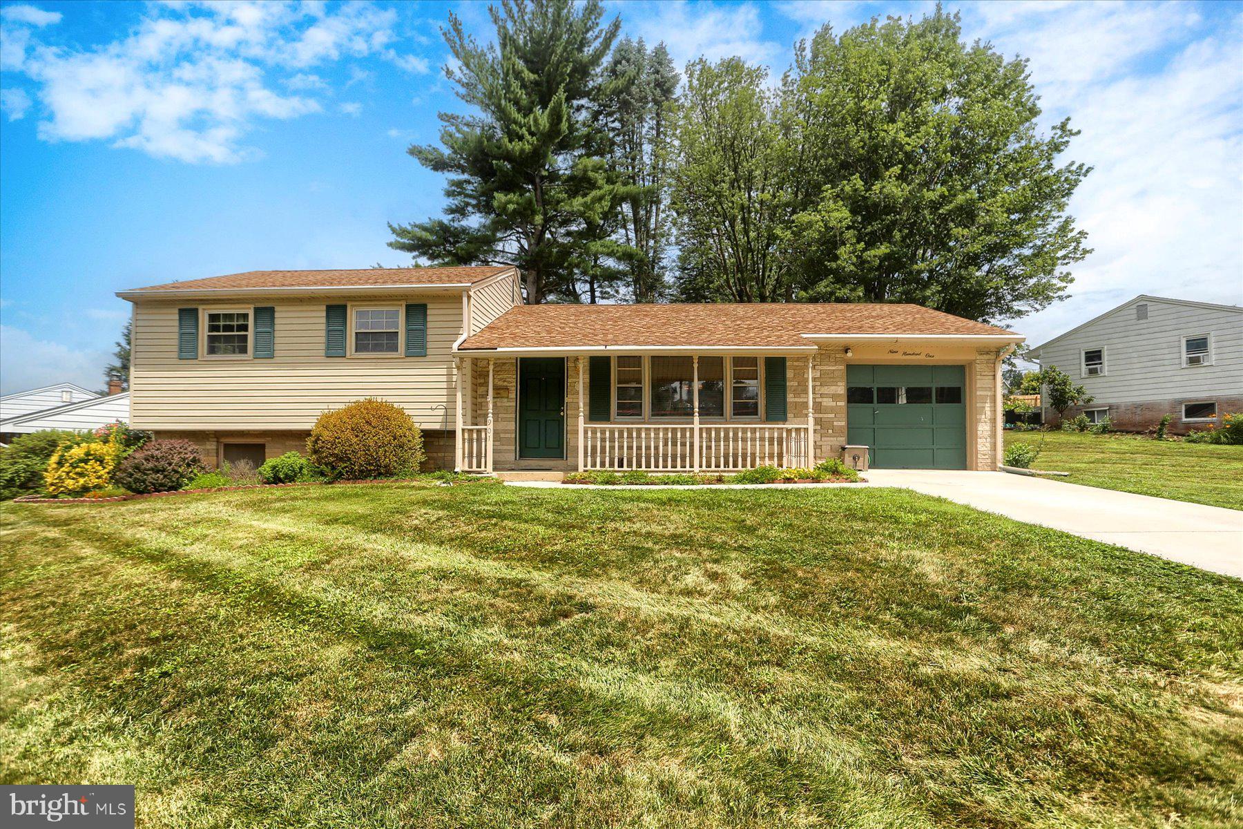 Nestled on a desirable corner lot, this charming 3-bedroom, 1 full + 1 half bath split-level home offers the perfect blend of comfort and practicality. The main level includes a large living area filled with natural light, a bright eat-in kitchen with a new oven/stove & dishwasher, and a dining area with hardwood flooring. There is also direct access to the garage from the main level.
Upstairs there are 3 comfortable bedrooms and a full bath. There is hardwood flooring under the carpet in the main floor living room and each bedroom.
The lower level consists of over 220 sq ft of additional finished living space that could be used as a second family room, rec room, office, or fourth bedroom. There is also a half bath on this level. There is a separate laundry area with direct access to the backyard, as well as a newly installed furnace and oil tank in 11/2024.
The backyard is truly something special-level, private, and surrounded by mature trees, creating a peaceful retreat right at home. A shed offers space for your tools or outdoor gear.
This home is move-in ready and waiting for you to make it your own. Schedule your private showing today.