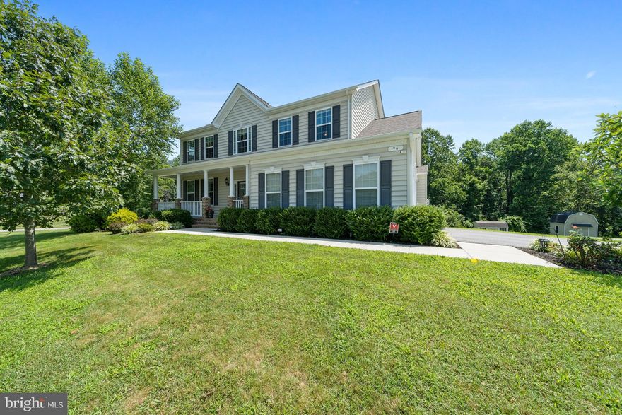 The beautiful neighborhood of Simmons Ridge offers this amazing property that showcases an open floor plan and features a formal living and dining room, a family room with a gas fireplace, a spacious kitchen with a center island, rich cabinetry, granite countertops & stainless steel appliances and a convenient mud room just off the 2-car garage.  Upstairs you will find 3 generously sized secondary bedrooms, a guest bathroom with ceramic tiling, a large laundry room and an owner's suite that includes a walk-in closet with built-in shelving and a luxury bath with a deluxe walk-in shower, double vanities and a corner soaking tub. The fully finished, walkout basement offers a multi-purpose recreation room with surround sound, a full bath and a bedroom.  Also don't miss the hardwood flooring, a deck overlooking the private, all useable rear yard,  a paved driveway and a shed. Best of all, this property is located in award-winning, nationally recognized HUNTINGTOWN HIGH school district and is in easy commuting distance to DC, NOVA, Andrews AFB and other surrounding cities.