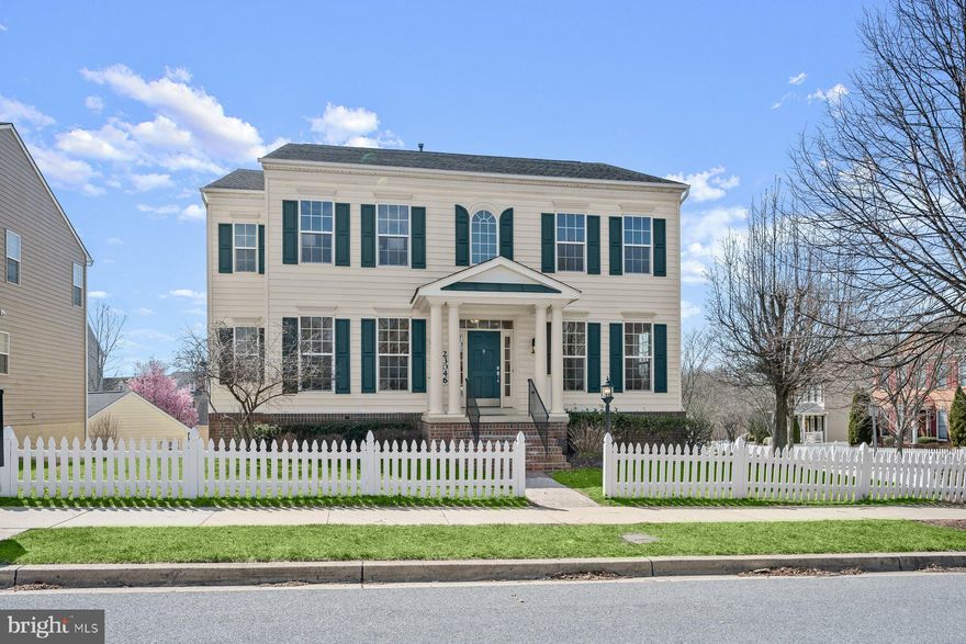 Welcome home to 23046 Winged Elm Drive in sought-after Clarksburg Village. Featuring the Chandler floor plan by Beazer Homes, this beautiful colonial boasts more than 5,000 square feet of luxury living space and occupies the largest corner lot within the Greenway Village Community. Could the white picket fence be any more charming? Nine foot ceilings and the grand foyer immediately impress and highlight the open-concept layout. Immaculately maintained hardwood flooring is found on every level. Main level highlights include an inviting living room, cozy family room with gas fireplace, bright and functional office, half bath, in-ceiling speaker system, and a refined dining room with columns and freshly painted walls. The updated bright and airy kitchen offers on-trend quartz countertops and backsplash, stainless steel appliances, custom 42” cabinets, a sun-drenched breakfast nook, and a convenient butler’s pantry for added storage. 

Upstairs, you’ll find three generously sized bedrooms, a shared ‘buddy' bathroom, a laundry area, and a lavish primary suite with tray ceiling, oversized soaking tub, and separate shower. The fully-finished lower level provides an in-law suite with kitchenette, an additional bedroom, a flex room, a full bathroom, a separate laundry area, and walkout access through double doors leading to the brick paver patio, sidewalk and spacious yard. Greenway Village residents enjoy a plethora of community amenities including two pools, a clubhouse and multiple playgrounds. Conveniently located near grocery stores, premium outlets, restaurants, and various shopping centers, this property is also a commuter’s dream with easy access to Routes 355, 27 and I-270 as well as the Shady Grove Metro and Marc Train. Hurry! 23046 Winged Elm Drive won’t last long.