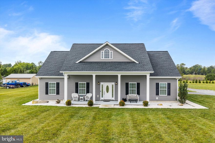 Stunning TO BE BUILT custom built home. Similar construction shown.  Features 3 bedrooms and 2 full baths all on one level and a 6.15 acre lot. This home has so much curb appeal, with the lovely symmetry of the building. The attached 2 car garage is side loading. You get the convenience of a garage without the eyesore. The large covered porch is ready for your rocking chairs. Inside you enter into the great room, with recessed lighting, ceiling fan, and stunning gas fireplace with built-in surrounds. The living room is open to the dining room and kitchen. This space is great for entertaining.  The island provides breakfast bar seating for 3. There is a large pantry for storage. Down the hall you have a large laundry room with sink and ample shelving storage. The primary suite features recessed lighting, ceiling fan and beautiful tray ceiling detail. The suite includes a private, ensuite bathroom. This luxury space features separate single bowl vanities, a walk-in shower, and a gorgeous free standing soaking tub. Your suite is topped off by a huge walk-in closet to exceed your storage needs. On the other side of the living space, you have 2 large bedrooms with overhead lighting and large closets. The hall bath features an extended single bowl vanity and tub/shower. Outside the rear of the home, you have another large covered porch. This is a great space to entertain in the warmer months! Call for more information today!