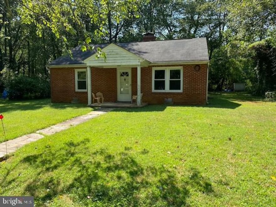Cute all brick rambler on 1.8 acres.  Right off rt 55.  All brick rambler with 2 bedrooms and 1 full bath. fireplace in living room.  Home sold strictly as is.  There is no survey.  There are 2 adjoining lots for sale also.