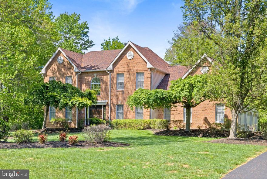 Wow is just the beginning to describe this exquisitely maintained  retreat nestled in an exclusive cul-de-sac within the desirable  Lower Gwynedd neighborhood.  This remarkable home, set against a backdrop of lush woodlands, offers a timeless elegance and smart design. Upon entering this 4 bedroom, 2.5 bath stately home, you are greeted by a grand two-story foyer with pristine hardwood floors. The expansive living room, adorned with French doors, seamlessly transitions into a sunlit family room boasting a gas fireplace with a marble surround and two skylights that create an inviting atmosphere, overlooking the gourmet kitchen—a culinary masterpiece. This kitchen is equipped with top-of-the-line stainless steel appliances, granite countertops, and an expansive island. Ample cabinetry and a dedicated pantry ensure plenty of storage, while a cozy breakfast nook with sliding doors offers easy access to the outdoors. The formal dining room, complete with crown molding, is perfect for hosting gatherings. Rounding out the first floor is a convenient laundry room, office and powder room along with access to the three-car attached garage. Head up to the second level to discover the luxurious primary suite. This serene retreat provides a sitting area with a custom walk-in closet, and an opulent bathroom featuring a double vanity, a spacious tiled shower with a specialized hand holding faucet plus a bubble whirl pool tub. Three additional bedrooms and a full bath complete the upper level. The lower level offers plenty of additional storage and allows for the ultimate imagination to finish and turn into more living space as needed. Step outside to a sprawling maintenance-free deck and beautifully landscaped backyard, a haven for relaxation and entertainment. This home is a true hidden gem in the heart of tranquility. Located in the award winning Wissahickon School District, close proximity to public transportation, plenty of shopping and restaurants and trails, parks and playgrounds near by!