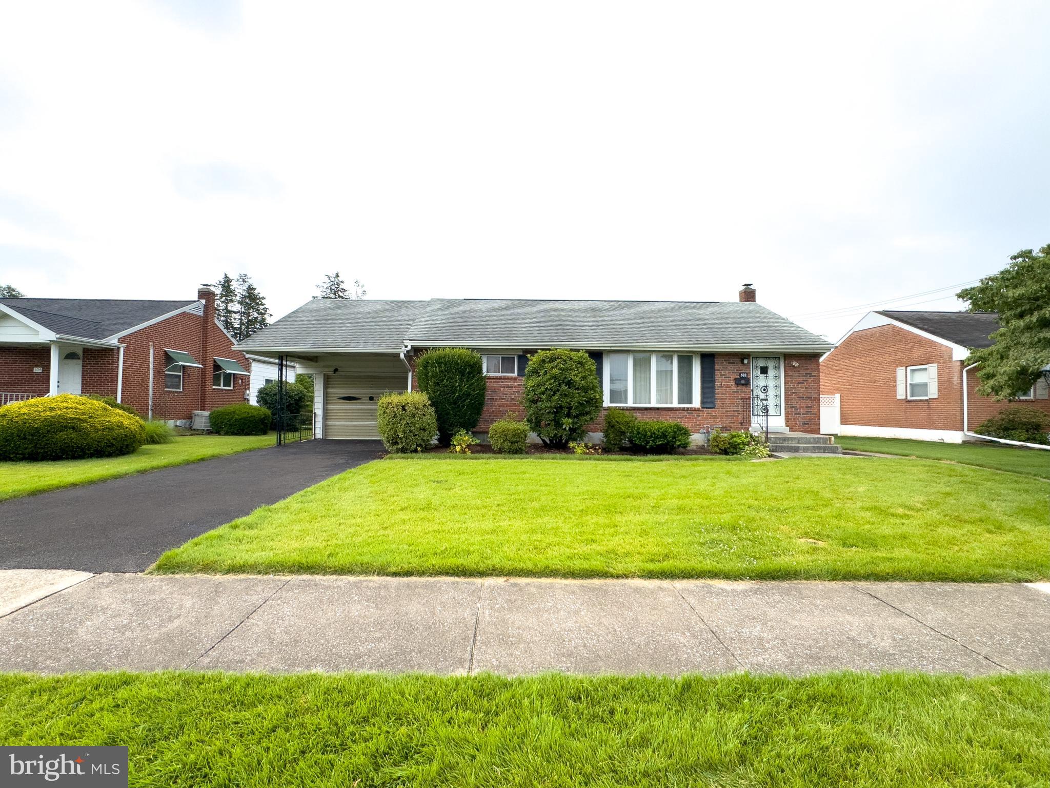 Looking for the perfect starter home or investment property? Come check out this 2 bdr, 2 full bath, rancher with 3rd bedroom potential. Entering the living room, it is easy to see how well this home was cared for. The newer hardwood floors shine with natural light throughout the living spaces. Entertain dinner guests in the dining room or convert it into a 3rd bedroom. Make your own game space in the large basement or enjoy some relaxation in the spacious sunroom. Tinker around in the additional workshop off the garage and park your car inside in the winter months. Have peace of mind with the brand new A/C central air unit (Installed 12/24), newly paved driveway, updated bathroom and gutter and main roof replacement in 2019. Don't delay! Schedule your showing today!