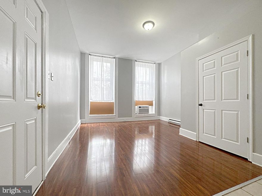 Welcome to Unit 1 at 1812 McCulloh Street – a spacious  2-bedroom, 2-bathroom residence situated in a charming multi-unit property in Baltimore's vibrant 21217 zip code. This unit features an open-concept layout with generous living and dining areas, baseboard heating for reliable warmth, and window A/C units for comfort during warmer months. The kitchen offers ample cabinetry and is complemented by an in-unit washer and dryer for added convenience. Enjoy close proximity to the YMCA, local shopping, dining, and public transit, making this an ideal location for urban dwellers seeking both comfort and accessibility.