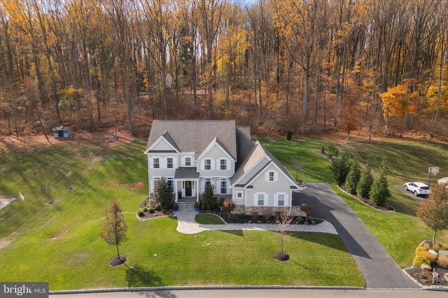 You will absolutely fall in love with this better than new, luxury home, in the Garnet Valley School District! Owners spared no expense in hand selecting premium options, including the lot location, backing to preserved land, the three car garage, the executive trim package with all the beautiful wood work and extra wide baseboards; not to mention the 10 ft ceilings on the main floor with massive 8 ft doors! You will love the richness of the engineered wood flooring throughout the main level, staircase and 2nd floor hall as well as the tongue and groove, coffered, bead board ceiling  in the great room! The kitchen was upgraded to a 30k gourmet chefs dream with double oven, gas stove with exhaust hood, built in microwave, large granite island, backsplash, butlers pantry with wine fridge and cabinets with glass display to highlight your favorite treasures! Additional built ins to highlight!!! Lets start with the VP office featuring double doors, study bookcase surround and window seat...working from home could not be more grand!! Keeping your home neat and organized, you will appreciate the mudroom cubbies and bench with the mud room trim package and upgraded large tile flooring!! This home is just amazing and so many details to highlight... The second floor features the primary suite with finished walk in closet, tray ceiling and spa like bath with stand alone tub and double vanities, a princess suite and laundry room along with 2 additional bedrooms and hall bath, plus the finished walkout basement with new full luxury bath and storage closets! Most recently, an irrigation system was added with a smart meter, maintenance free deck, speaker sound system  and an abundance of professional landscape!  Chester Heights is rated one of the top places to live in Delaware County and convenient to major roadways, Media Line Train Station, Philadelphia Airport, Wilmington, West Chester, Media and KOP as well as fine dinning and shopping!!
Schedule your showing now so you can be in your new home for the holiday season!