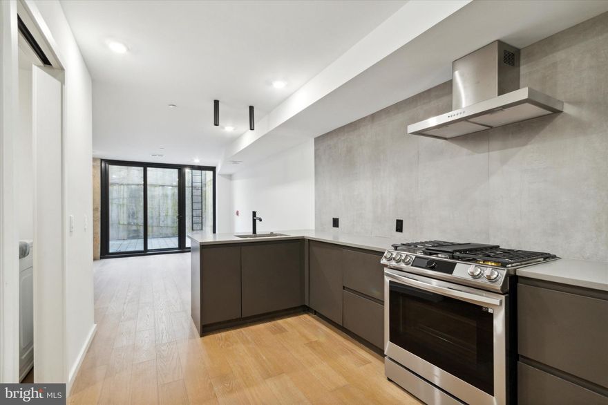 Introducing The Fitzwater Collection, a boutique collection of
architecturally-significant, design-driven new construction residences in the highly
desirable Graduate Hospital neighborhood of Philadelphia, Pennsylvania. Unit 1 has a
spacious bi-level floorplan with the 1st floor and subterranean levels spatially maximized
with an incredibly efficient, naturally flowing layout—plus a massive sunken yard for
quiet private outdoor enjoyment and entertaining. The kitchen and bathrooms feature an inspired fit, finish and fixture kits. Dramatic exterior curb appeal along tree-lined Fitzwater
Street—courtesy of Moto Designshop. Exceptional interiors, spacious living area, ample closet space, hardwood flooring throughout, soaring ceiling heights, abundant natural light via Southern exposure, and convenient Latch building/unit entry system for a keyless, easygoing lifestyle. Easy walk into Rittenhouse Square, Center City, South Street. Grad Hospital is one of the preferred
neighborhoods throughout Greater Philadelphia.  Full10yr tax abatement. Construction is
finished and the property is move-in-ready; a turnkey new construction home in an
incredible location at an affordable price — The Fitzwater Collection is ready to call
home! This turnkey new development in 19146 is one of the
finest examples of urban infill development in Philadelphia. Ask about our exclusive preferred lending options including an attractive rate buydown program and other mortgage/financial incentives.