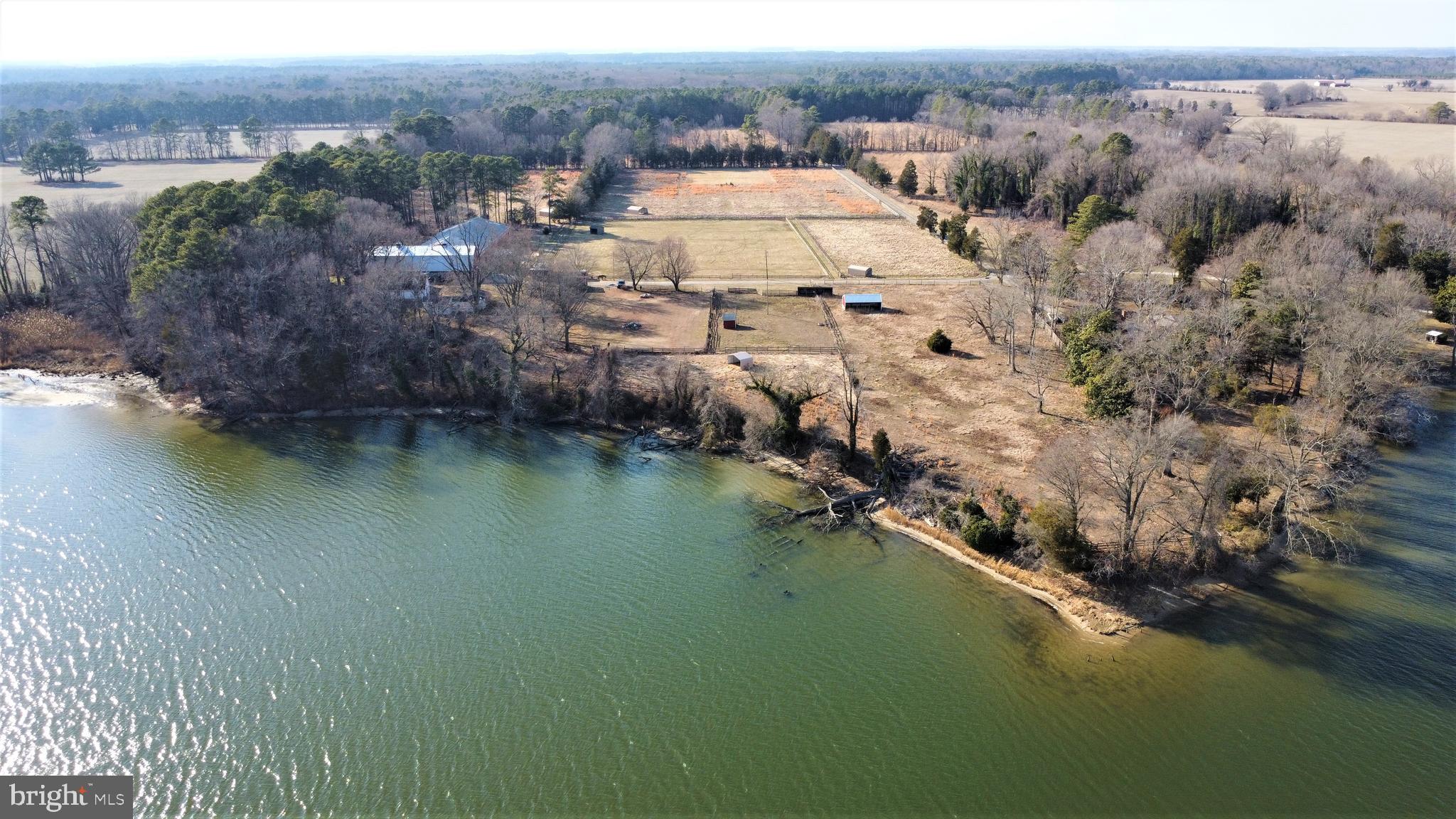 Miles River Pony Farm, first time offered since 1948! 30 acres of prime Talbot County waterfront with deep water, high elevation, 1000 feet of waterfront and great exposure. The property has an indoor riding ring that is 172x72 feet, at least 8 run in sheds, a main barn with 19 stalls and a tack room, a smaller barn with 4 stalls, two residences on the property and tons of fenced in pasture. Professional photos coming soon.
